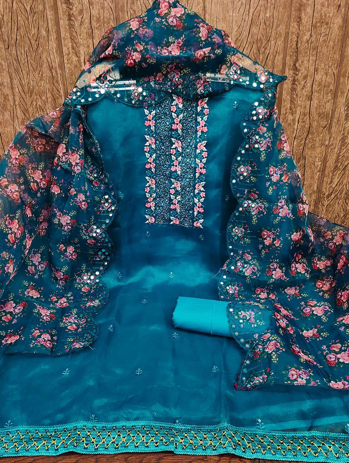 women solid with work embroidered unstitched suit set