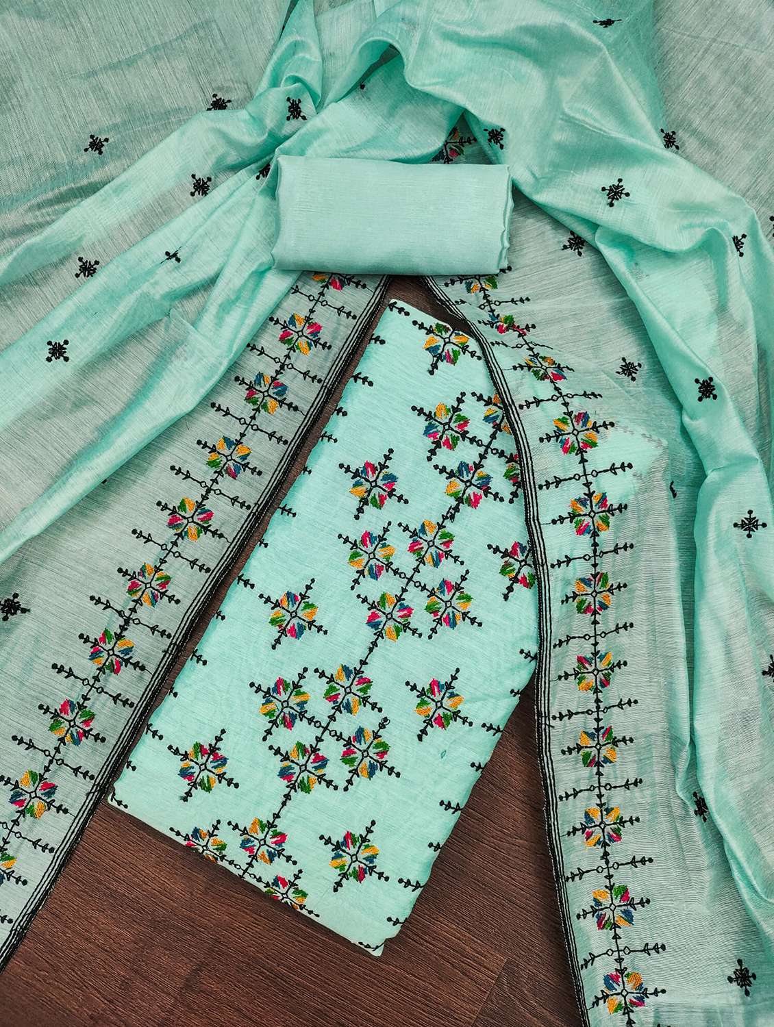 women solid with work embroidered unstitched suit set