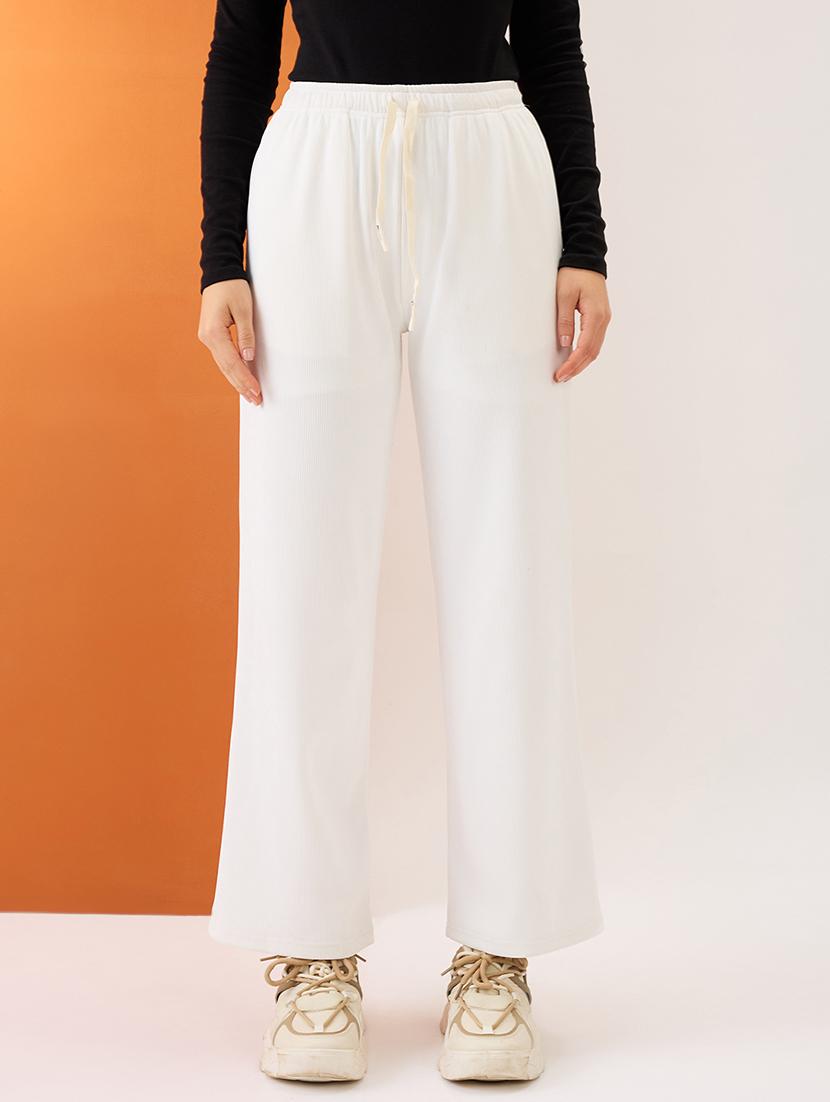 women white self design mid-rise stretchable straight fit trousers