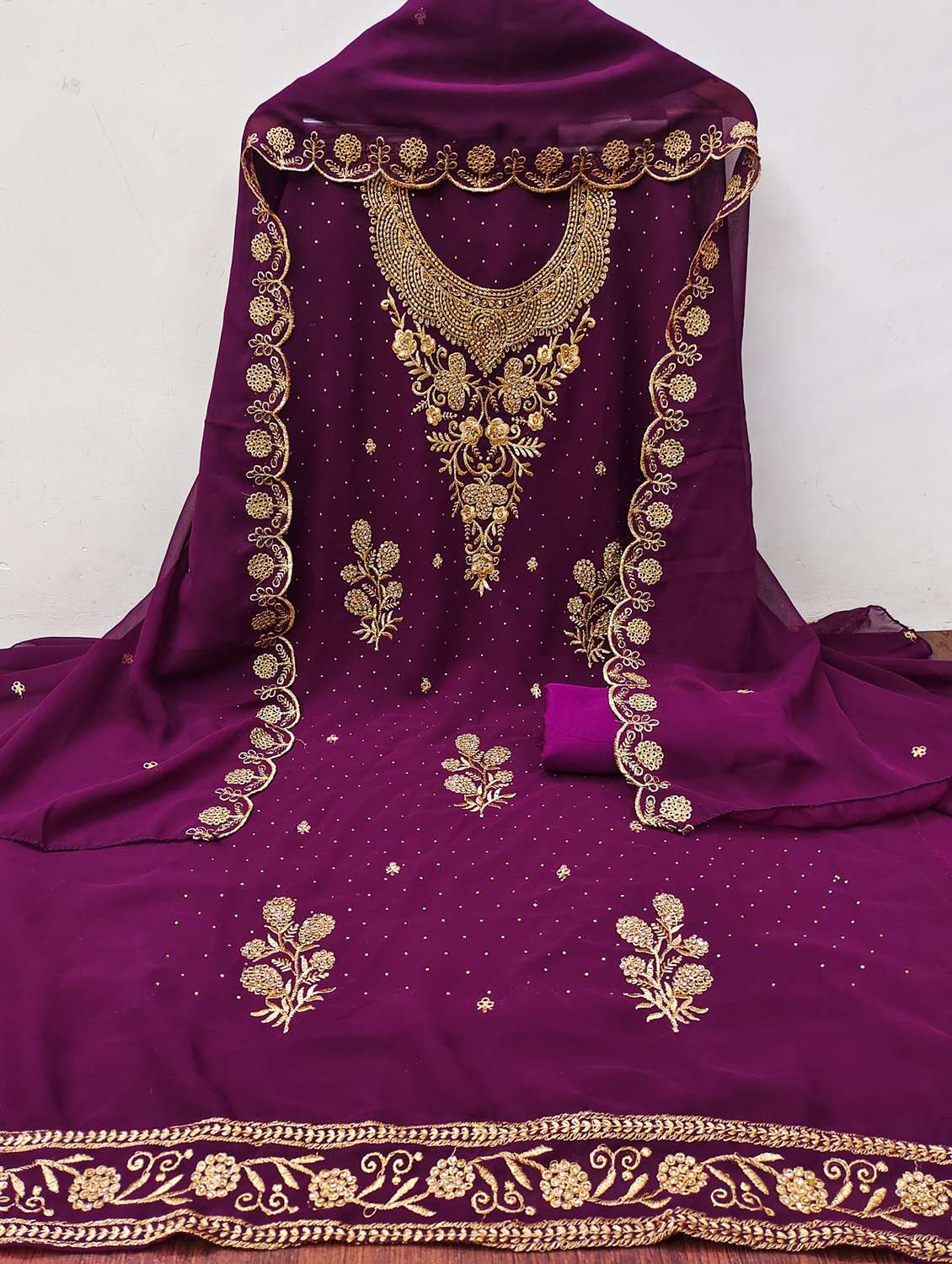 women solid with work embroidered unstitched suit set