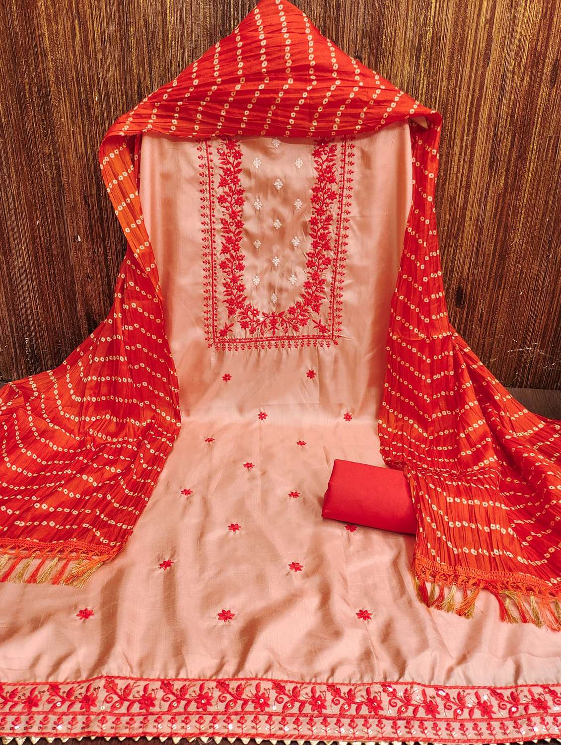 women solid with work embroidered unstitched suit set