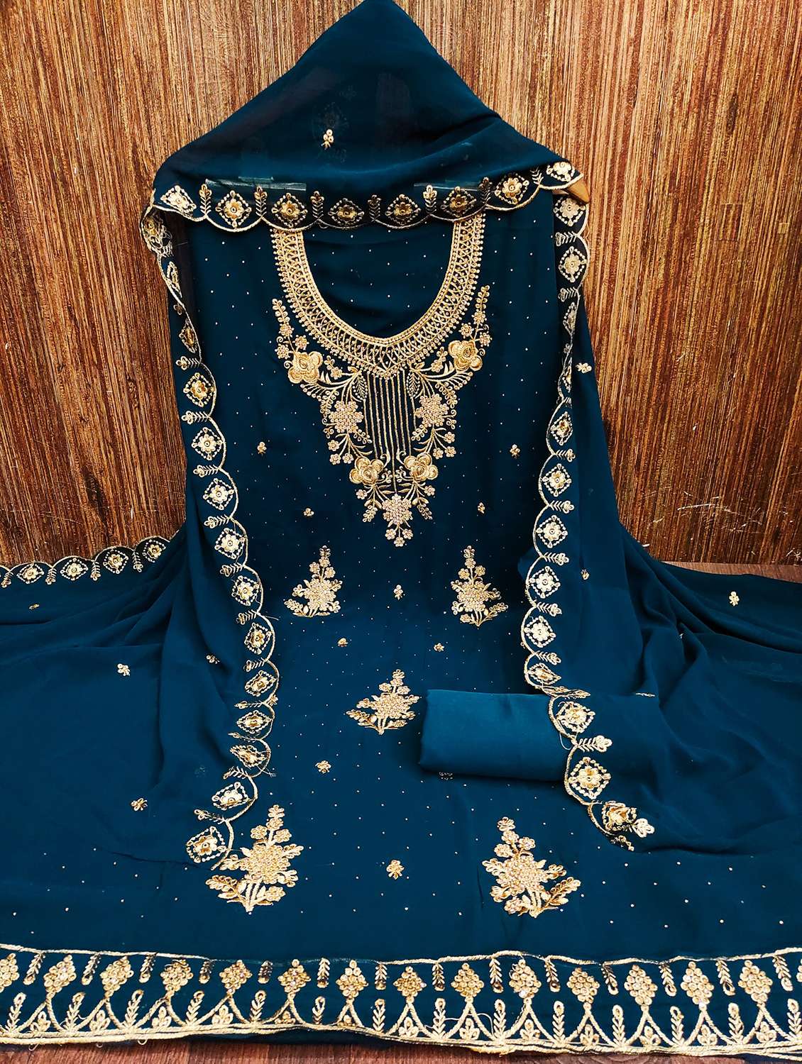 women solid with work embroidered unstitched suit set