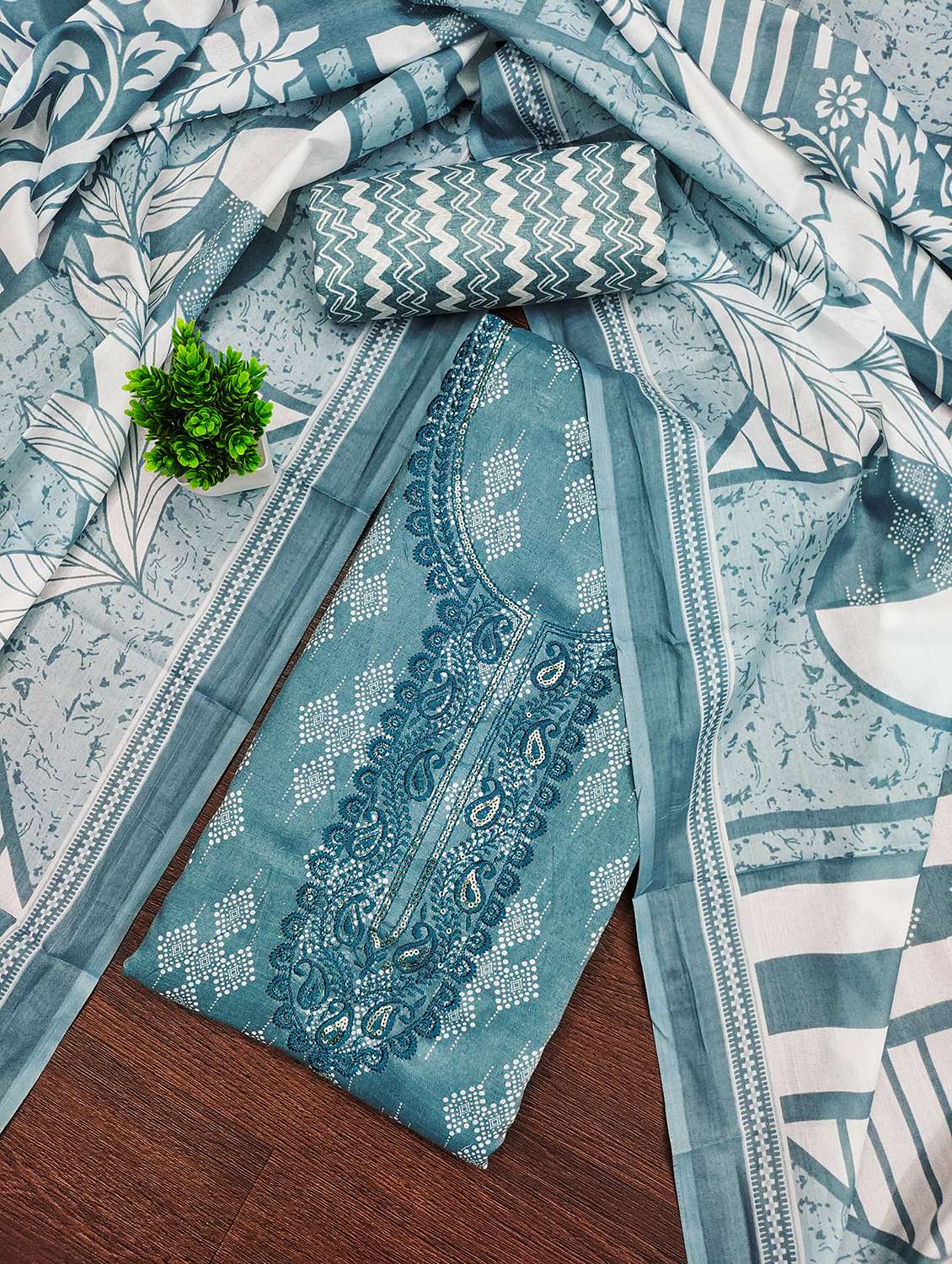 women printed with embroidery work unstitched suit set