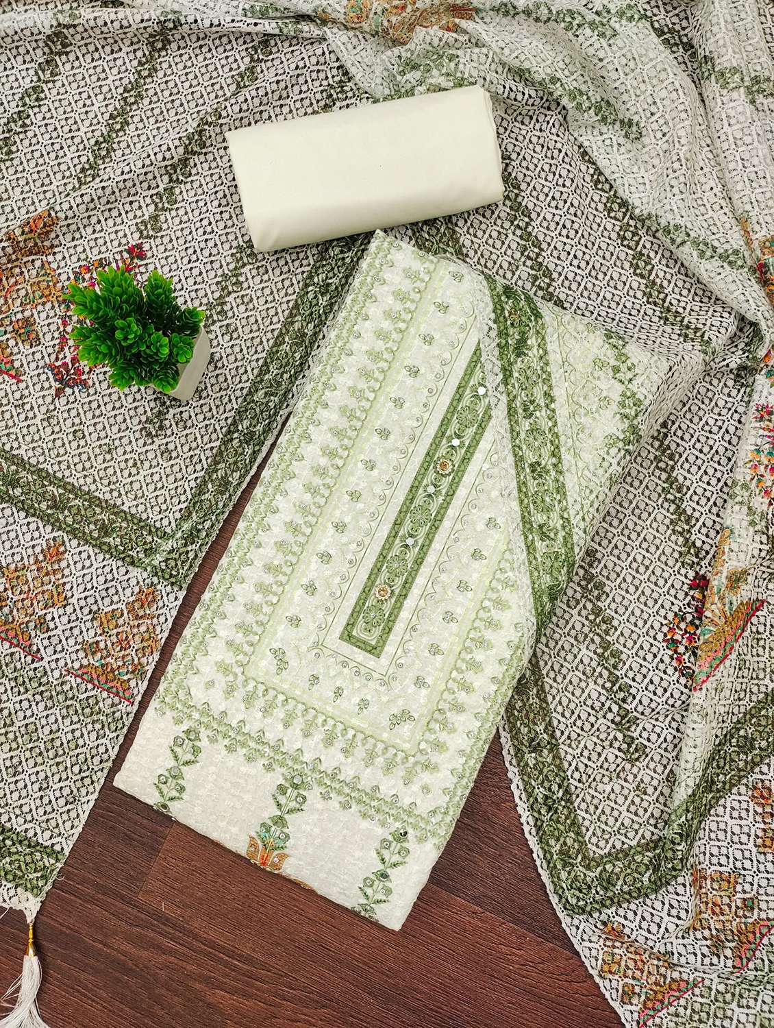 women embroidered unstitched suit set