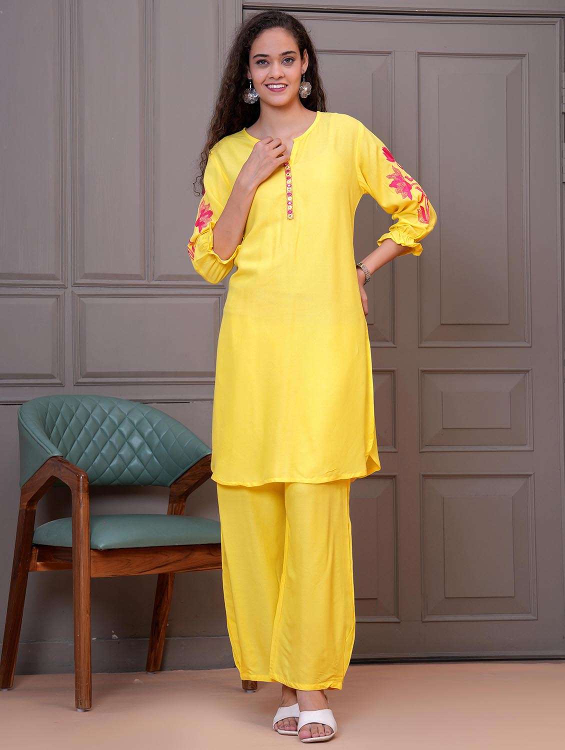 women embroidered round neck kurta and palazzo set