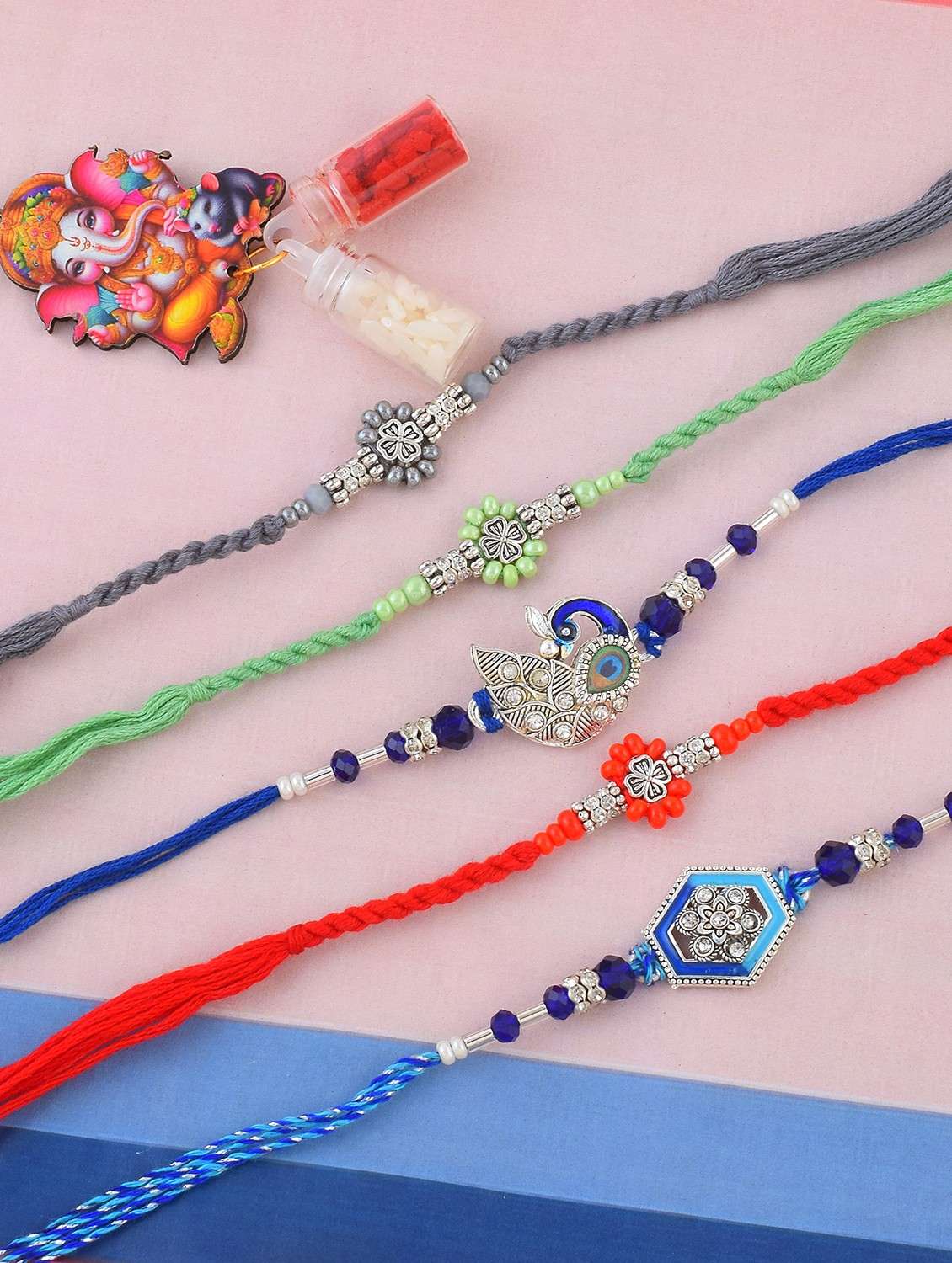 pack of 5 beaded rakhi set with roli and chawal - 21981834 - Zoom Image - 0