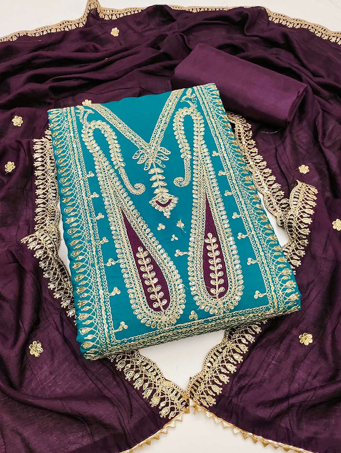 women solid with work embroidered unstitched suit set