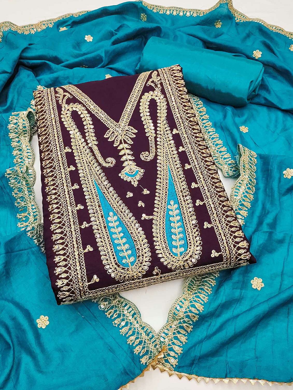 women solid with work embroidered unstitched suit set