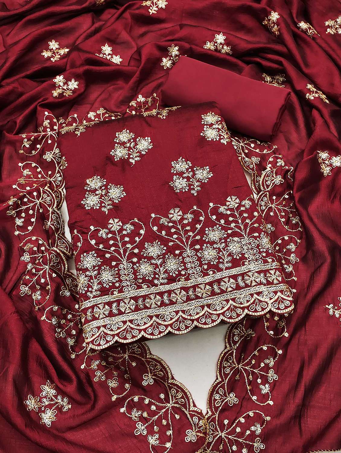 women solid with work embroidered unstitched suit set