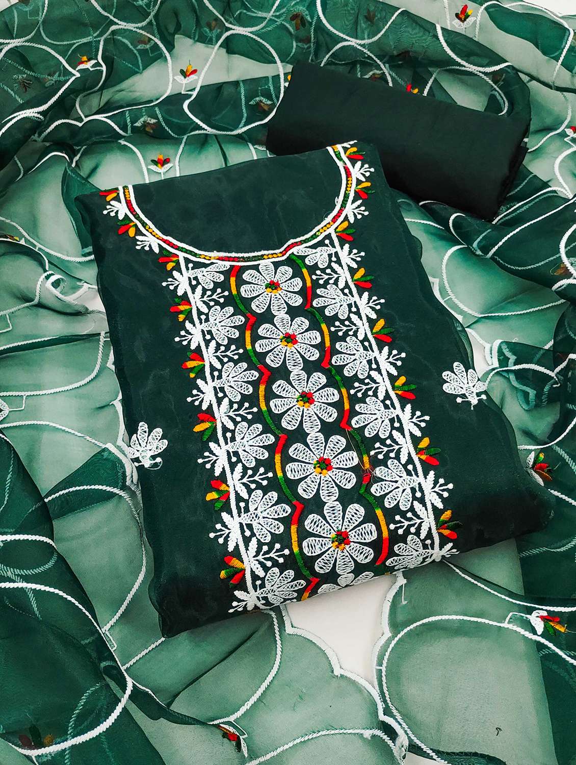 women solid with work embroidered unstitched suit set