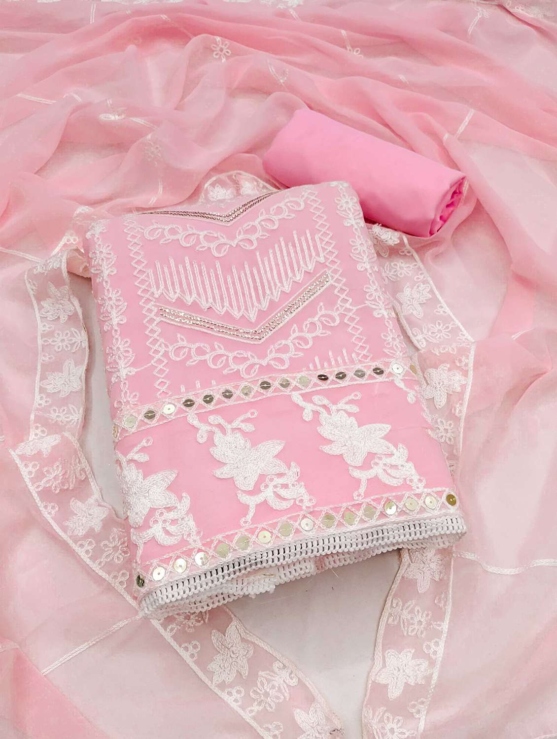 women solid with work embroidered unstitched suit set