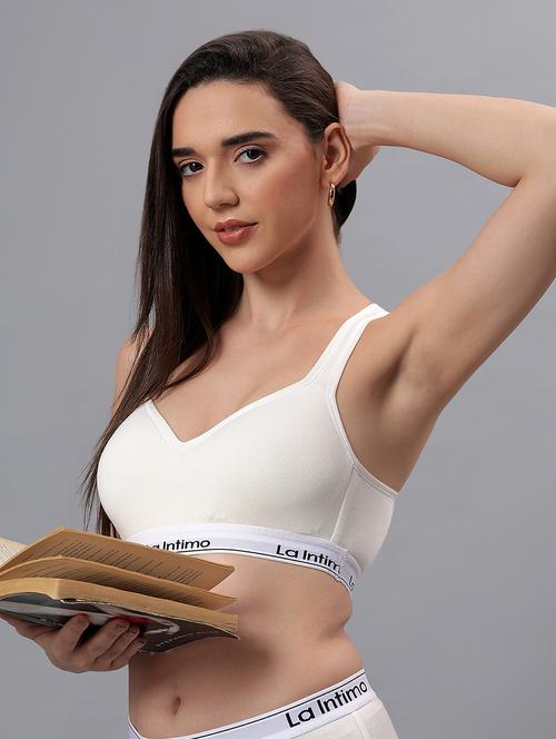 women solid lightly padded sports bra - 21993119 -  Standard Image - 0