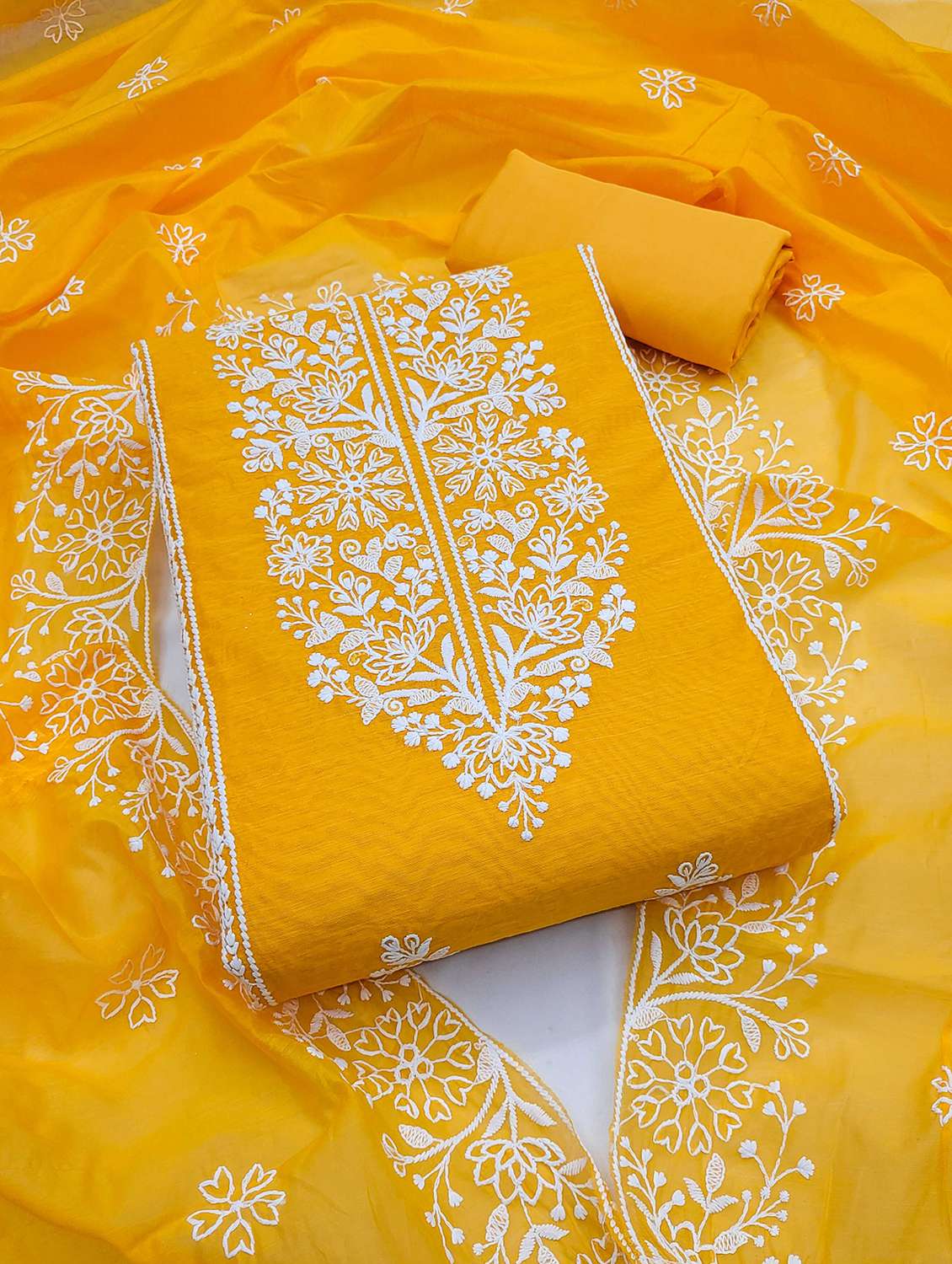 women embroidered unstitched suit set