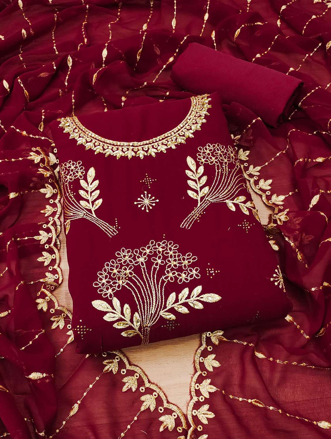 women embroidered unstitched suit set