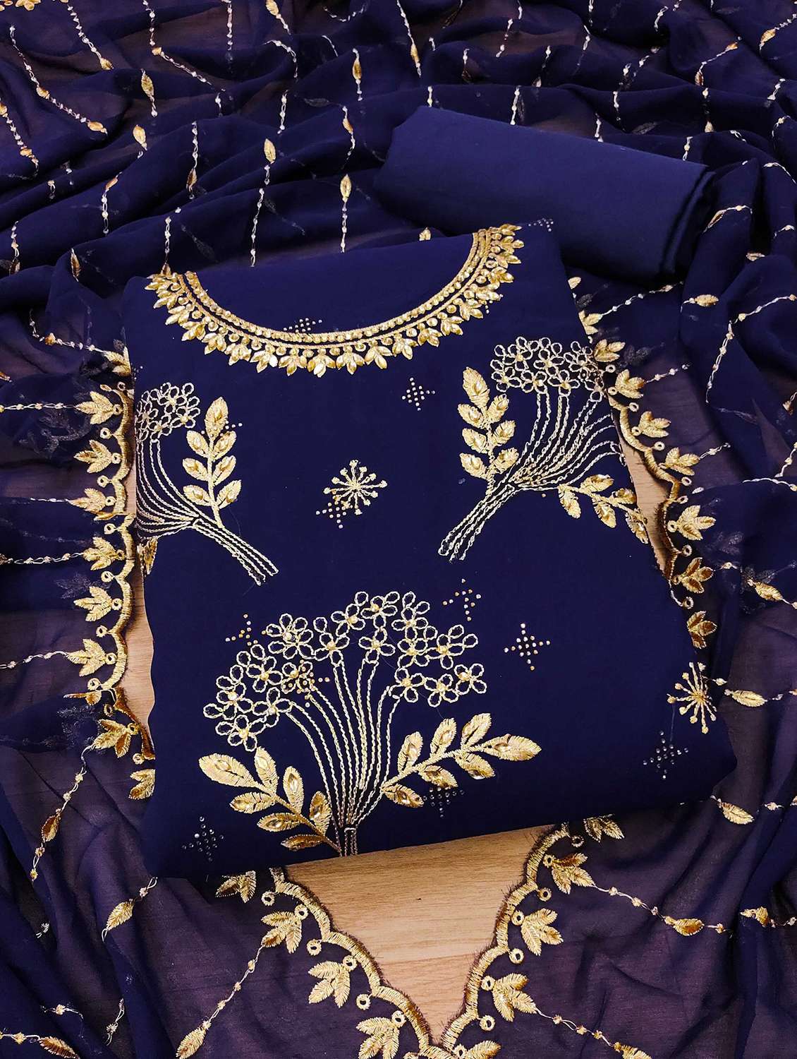 women embroidered unstitched suit set