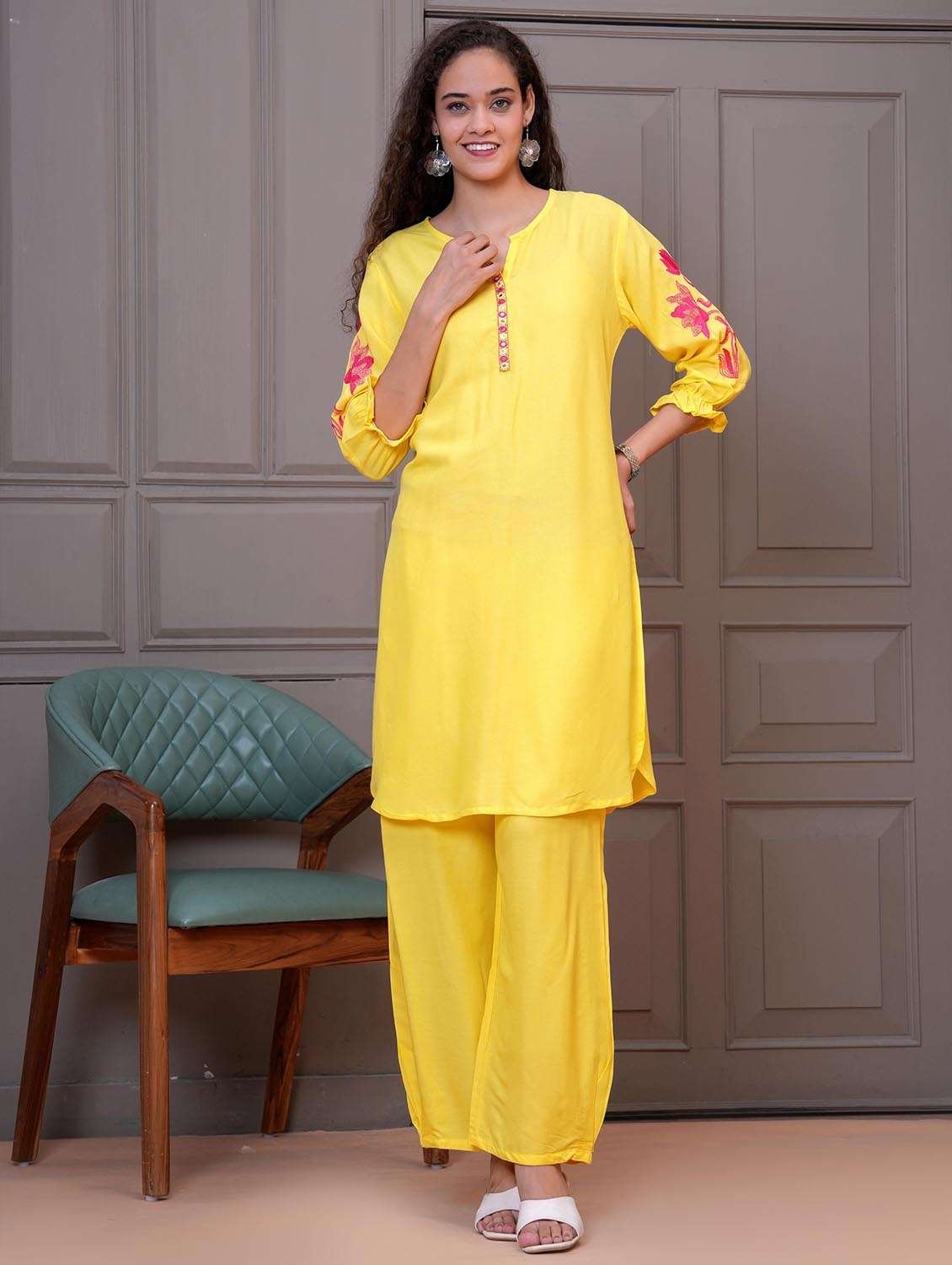 women embroidered kurta and palazzo set