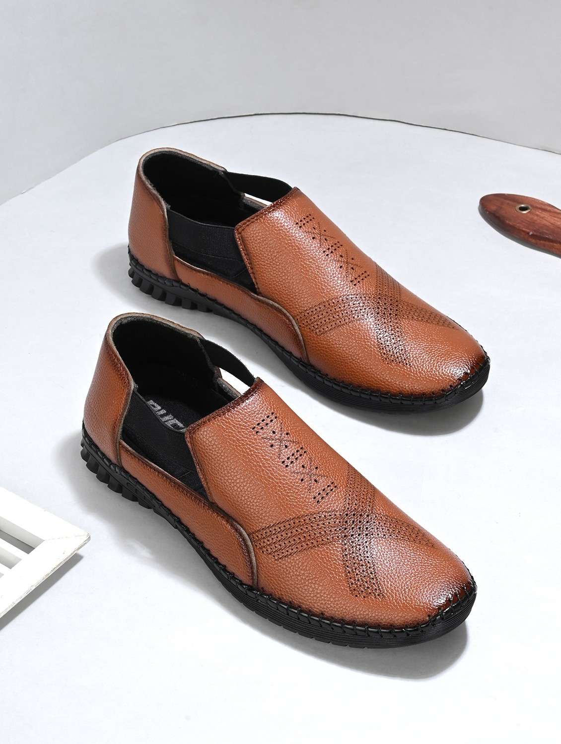 men tan slip on sandal