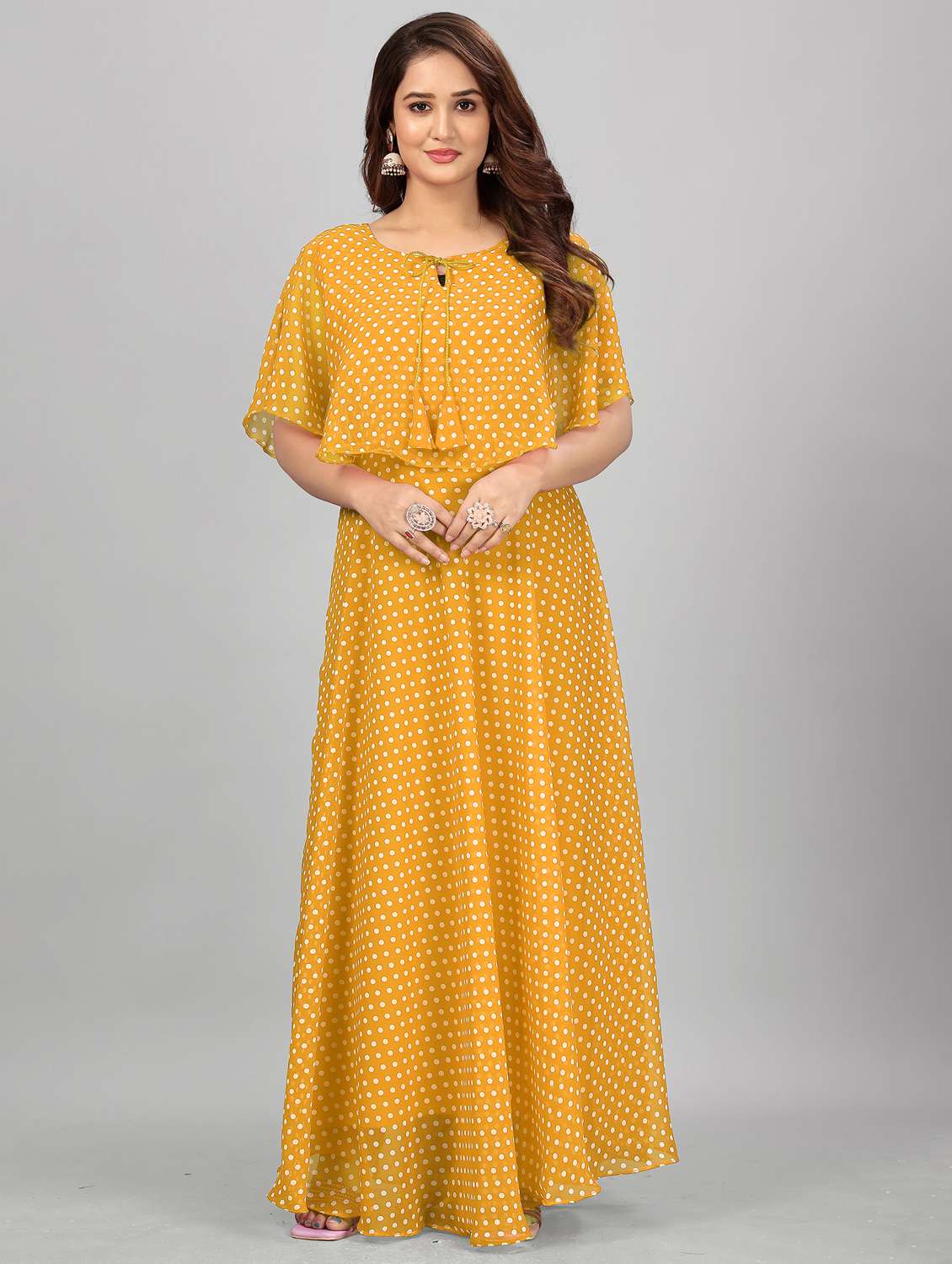 women polka dot tie up neck semi-stitched gown