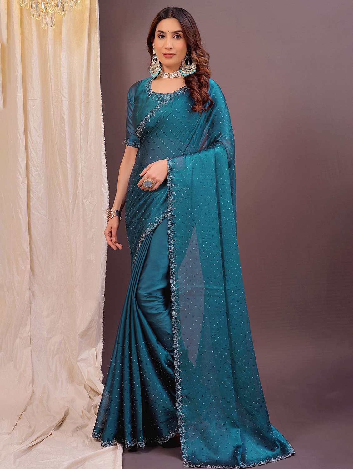 women solid with work embellished saree with blouse