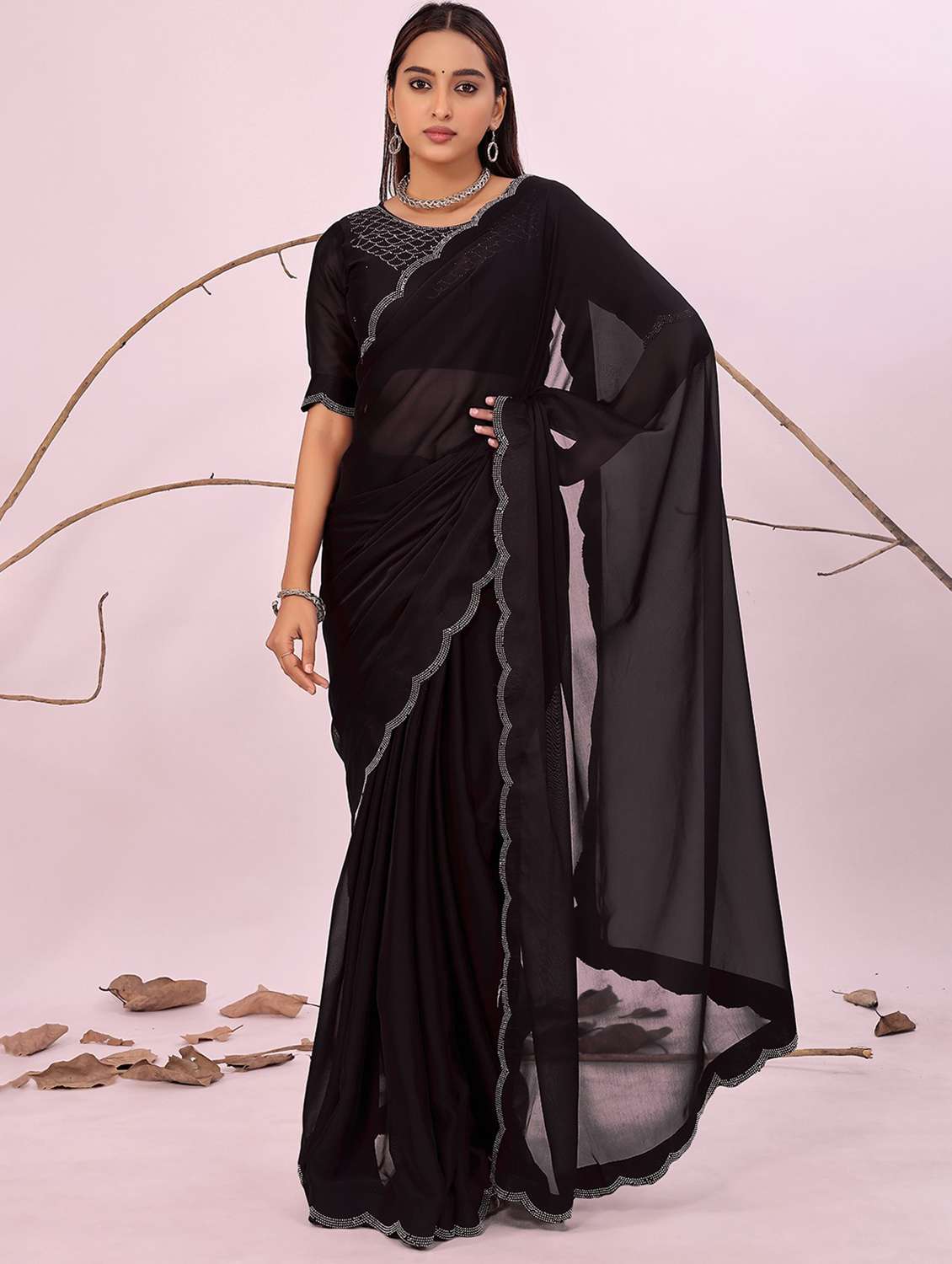 women solid with bordered embellished saree with blouse