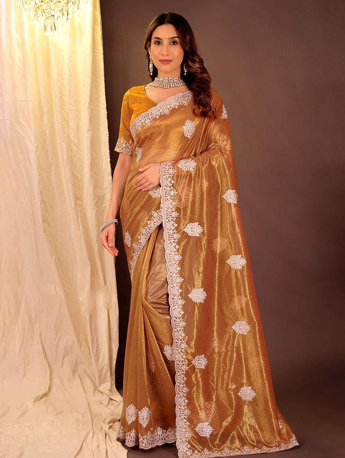 women solid with work embroidered saree with blouse