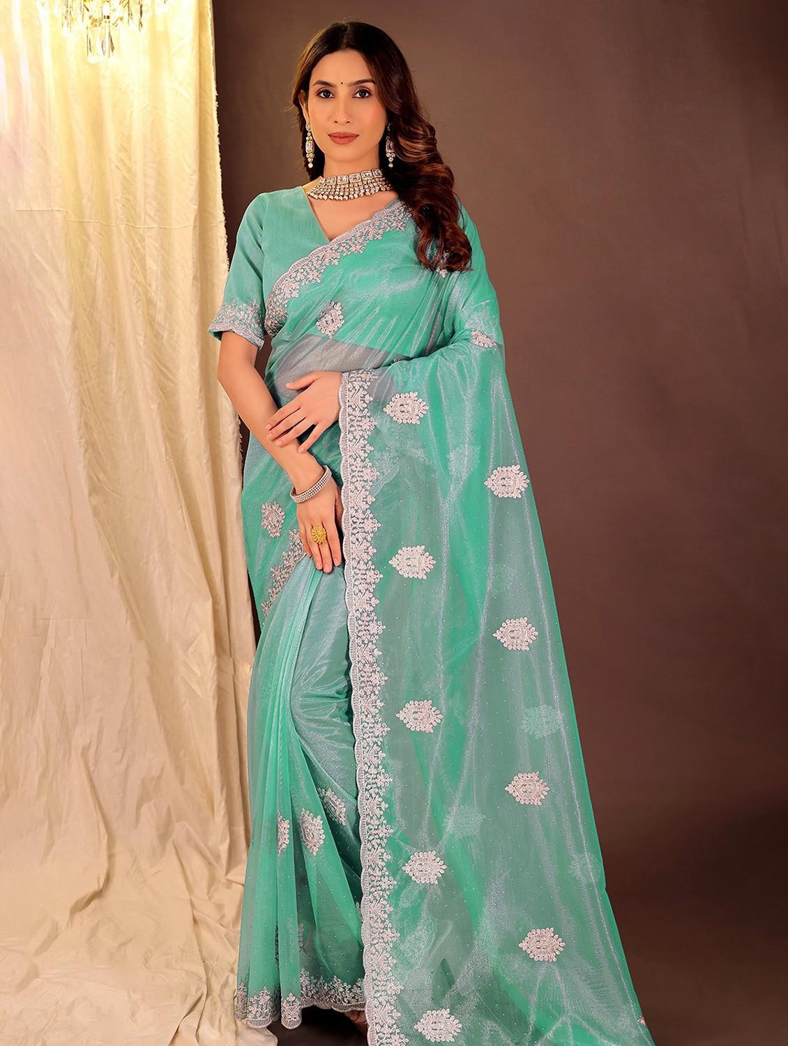 women solid with work embroidered saree with blouse