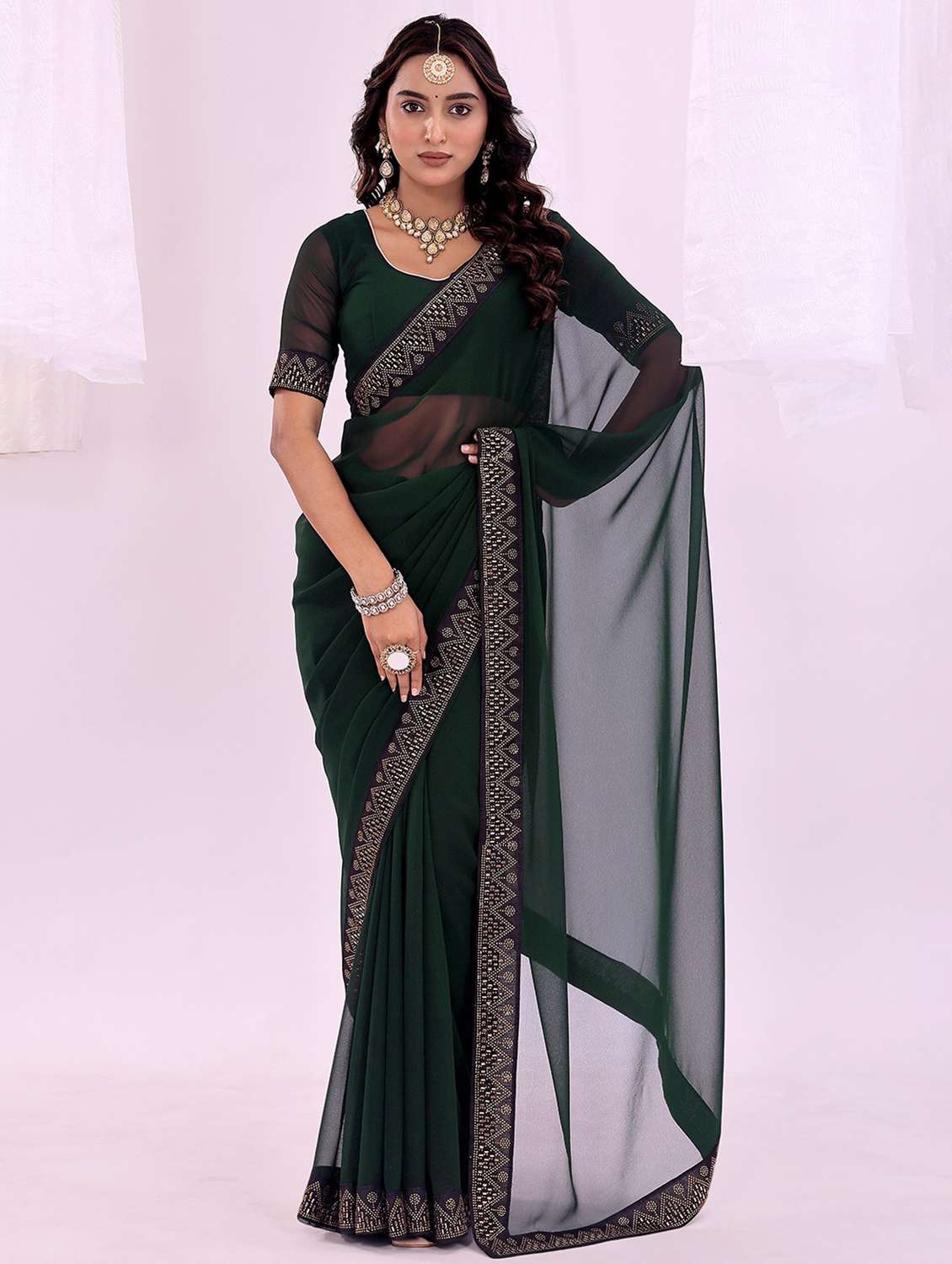 women solid with bordered saree with blouse
