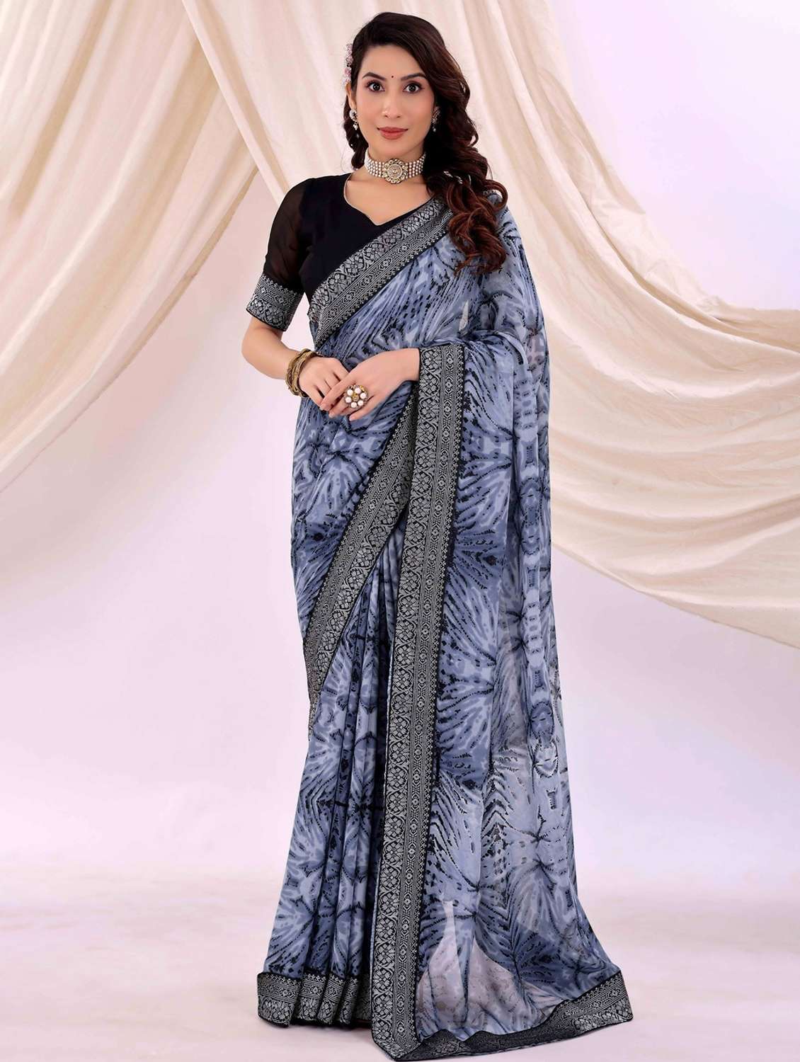 women printed bordered saree with blouse