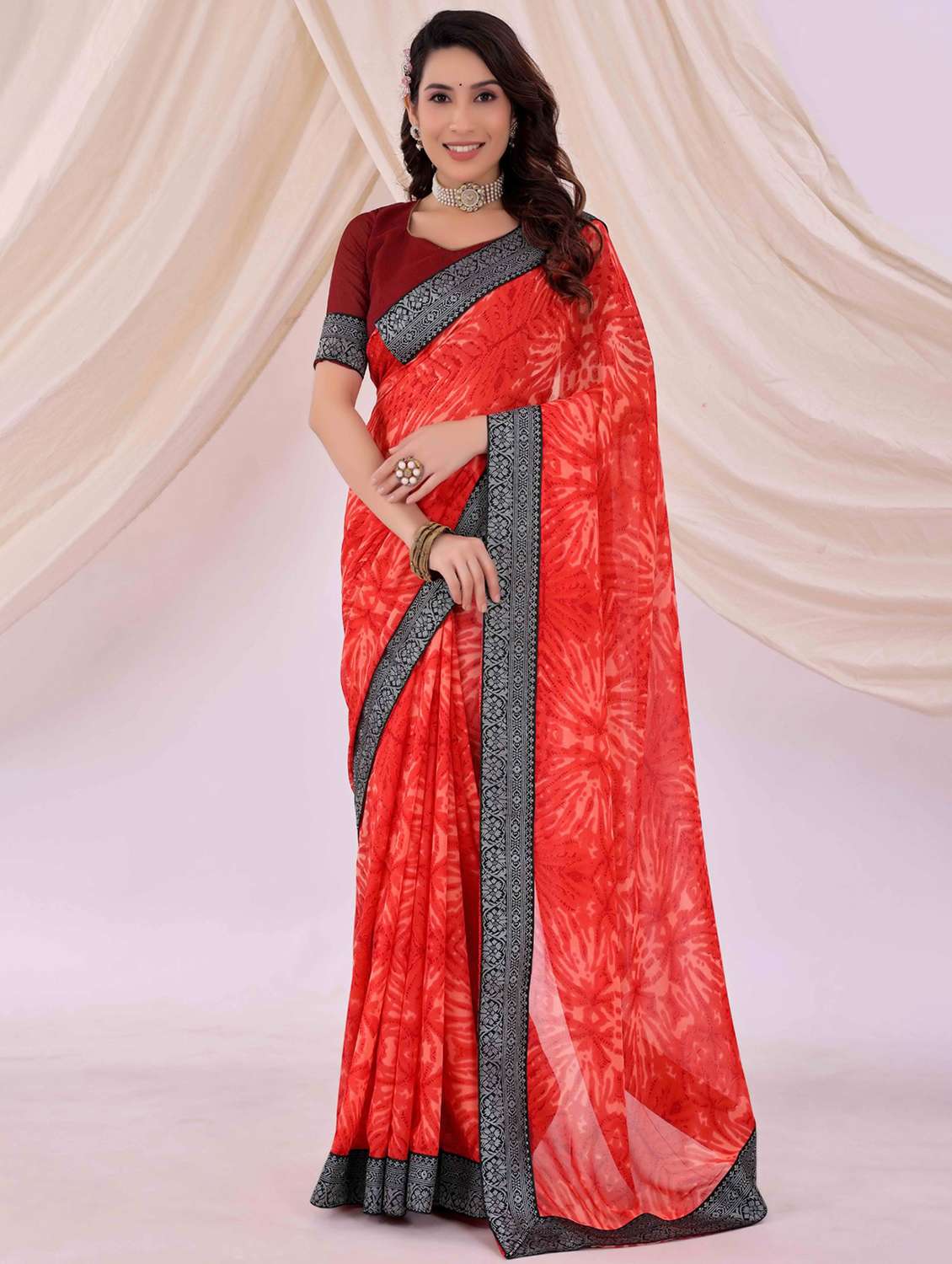 women printed bordered saree with blouse