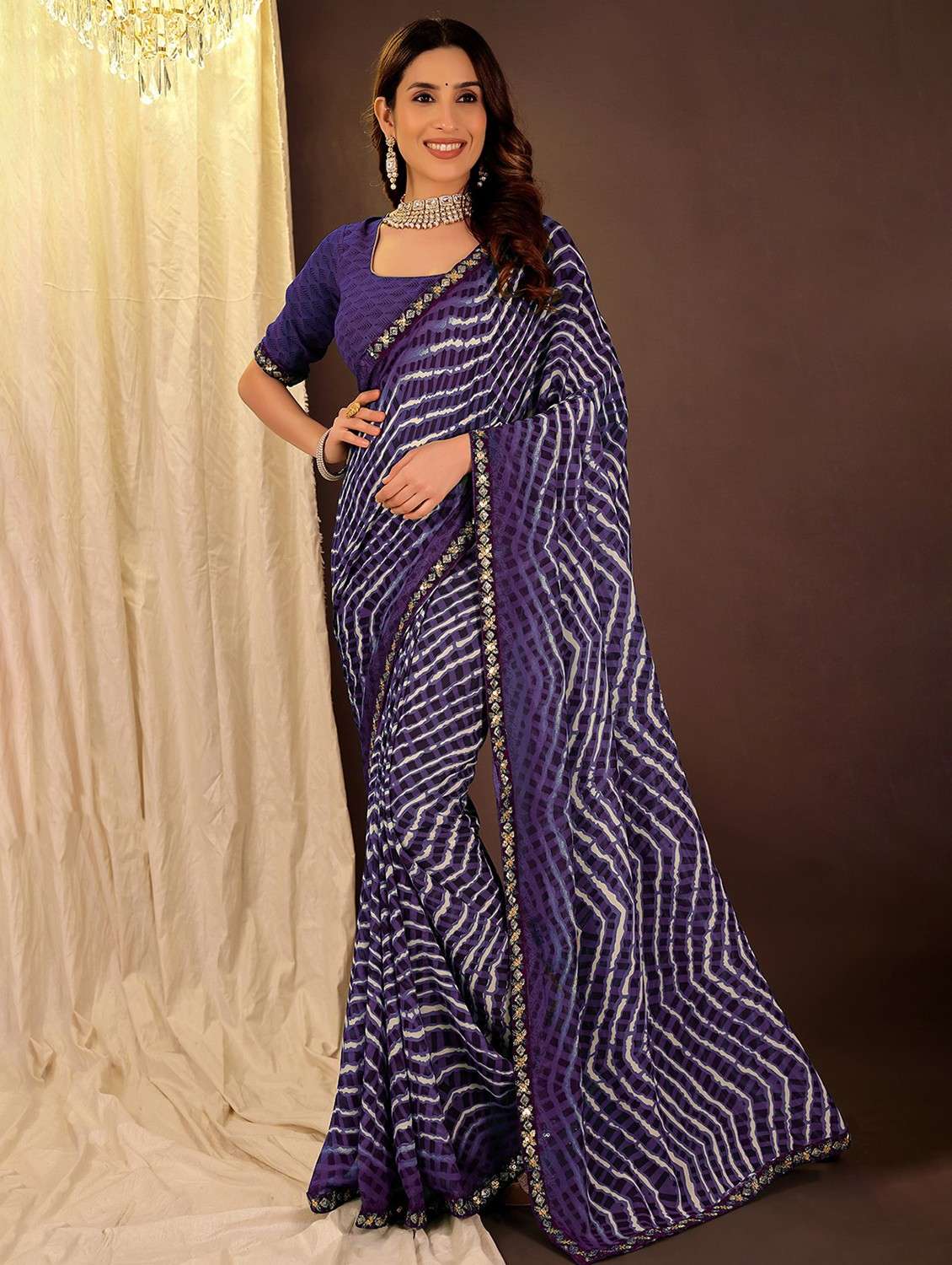women leheriya printed saree with blouse