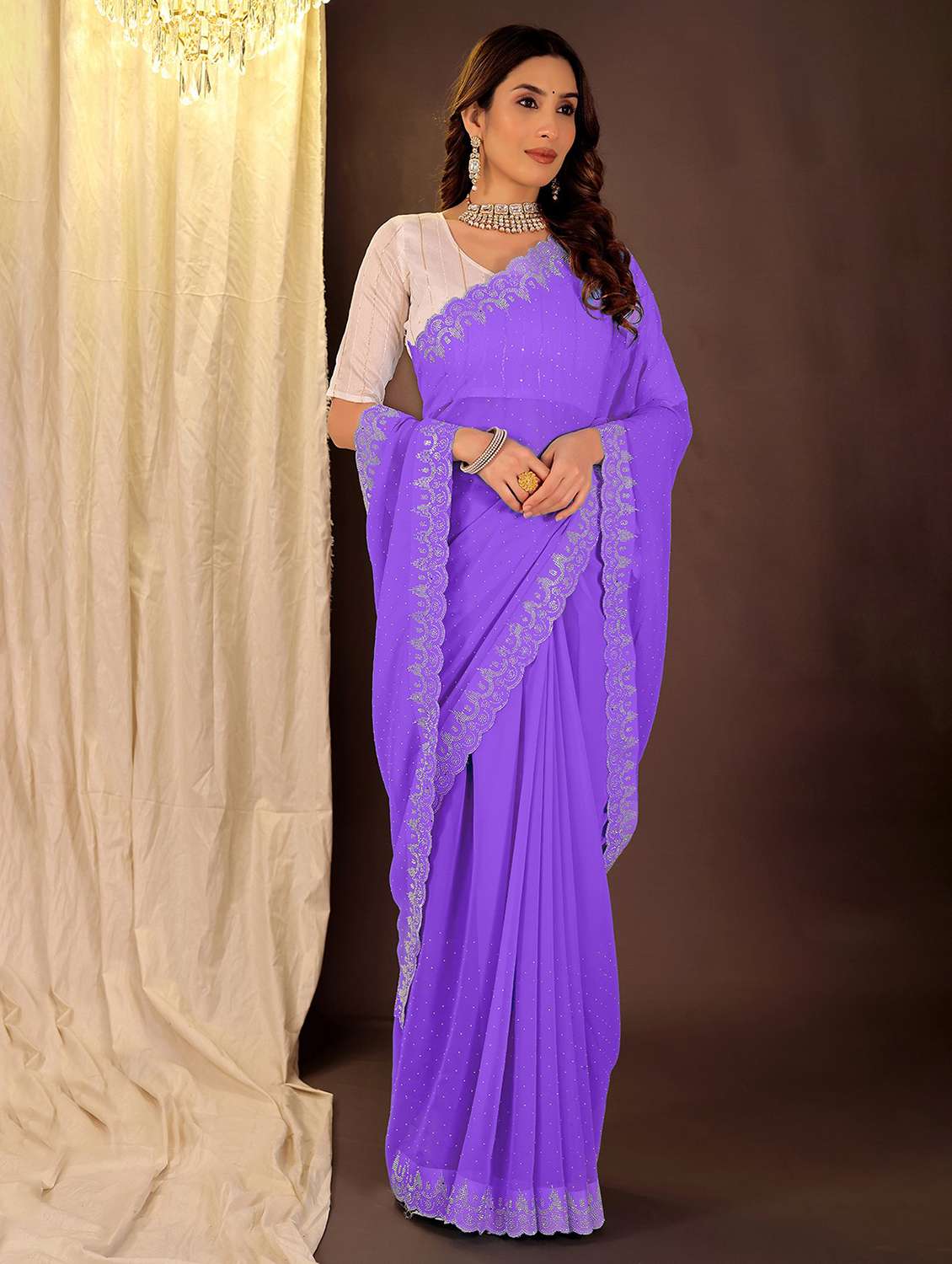 women solid with work embellished saree with blouse