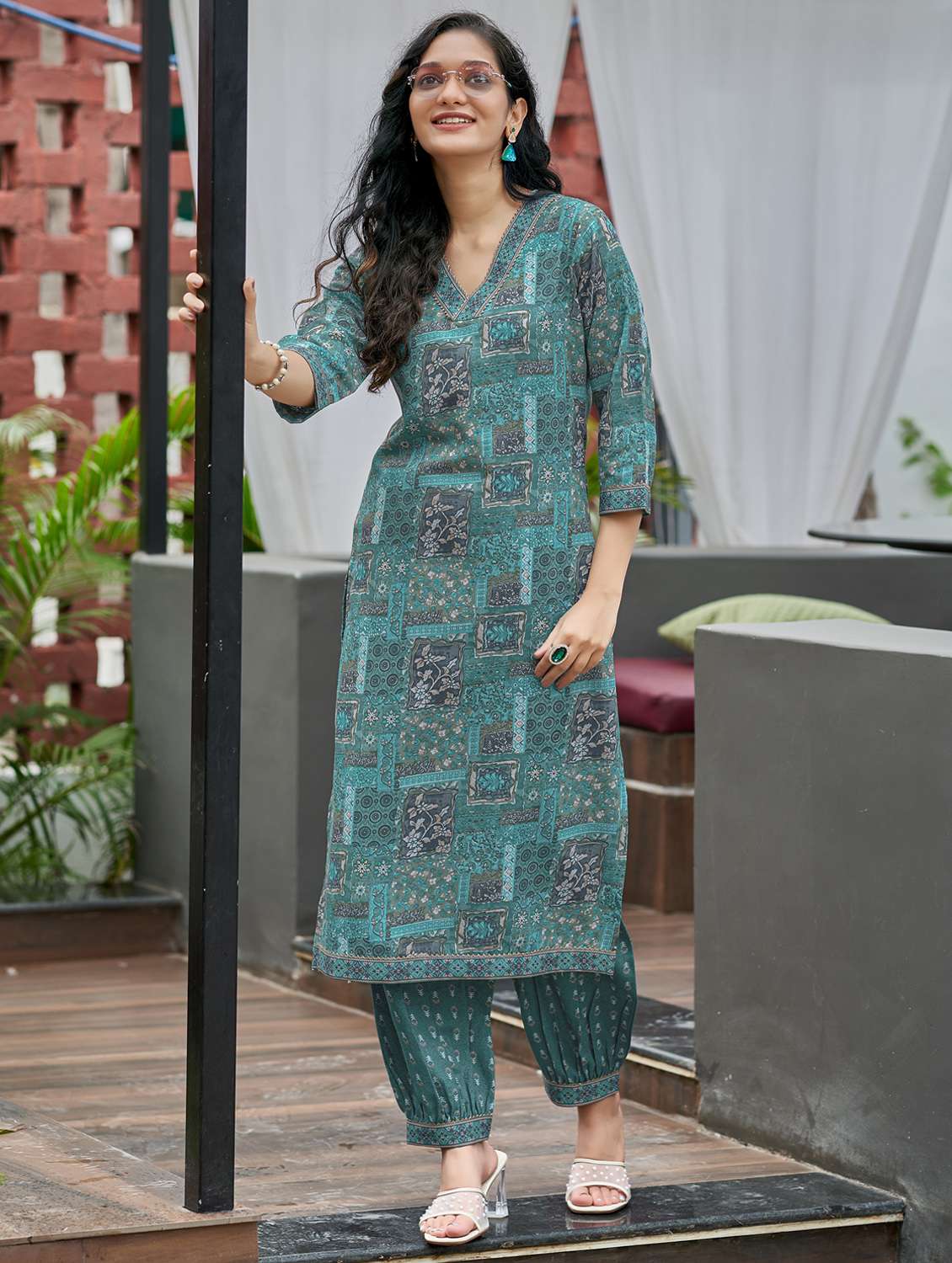 women printed three quarter sleeve kurta and salwar set