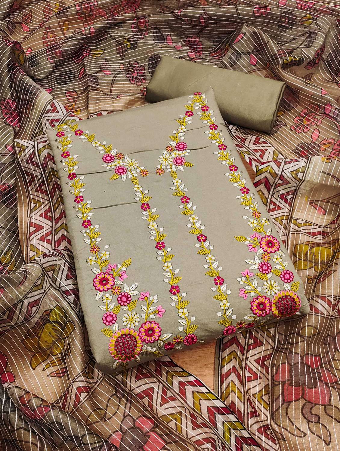 women solid with work embroidered unstitched suit set