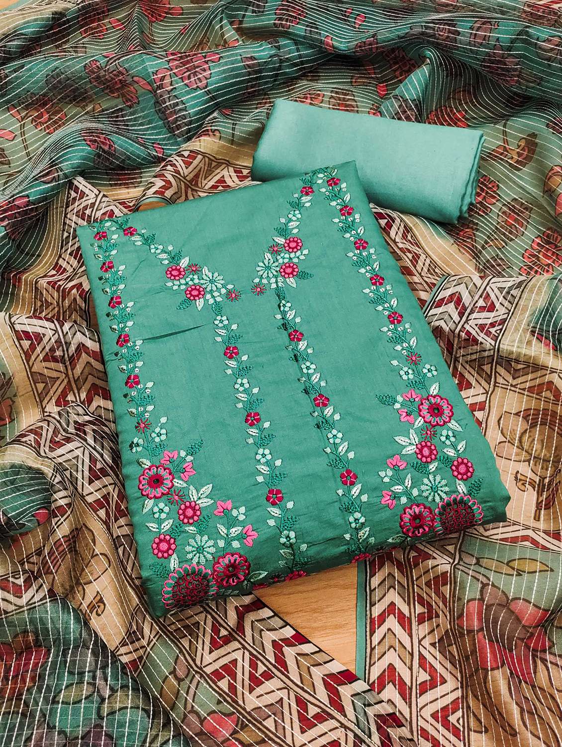 women solid with work embroidered unstitched suit set