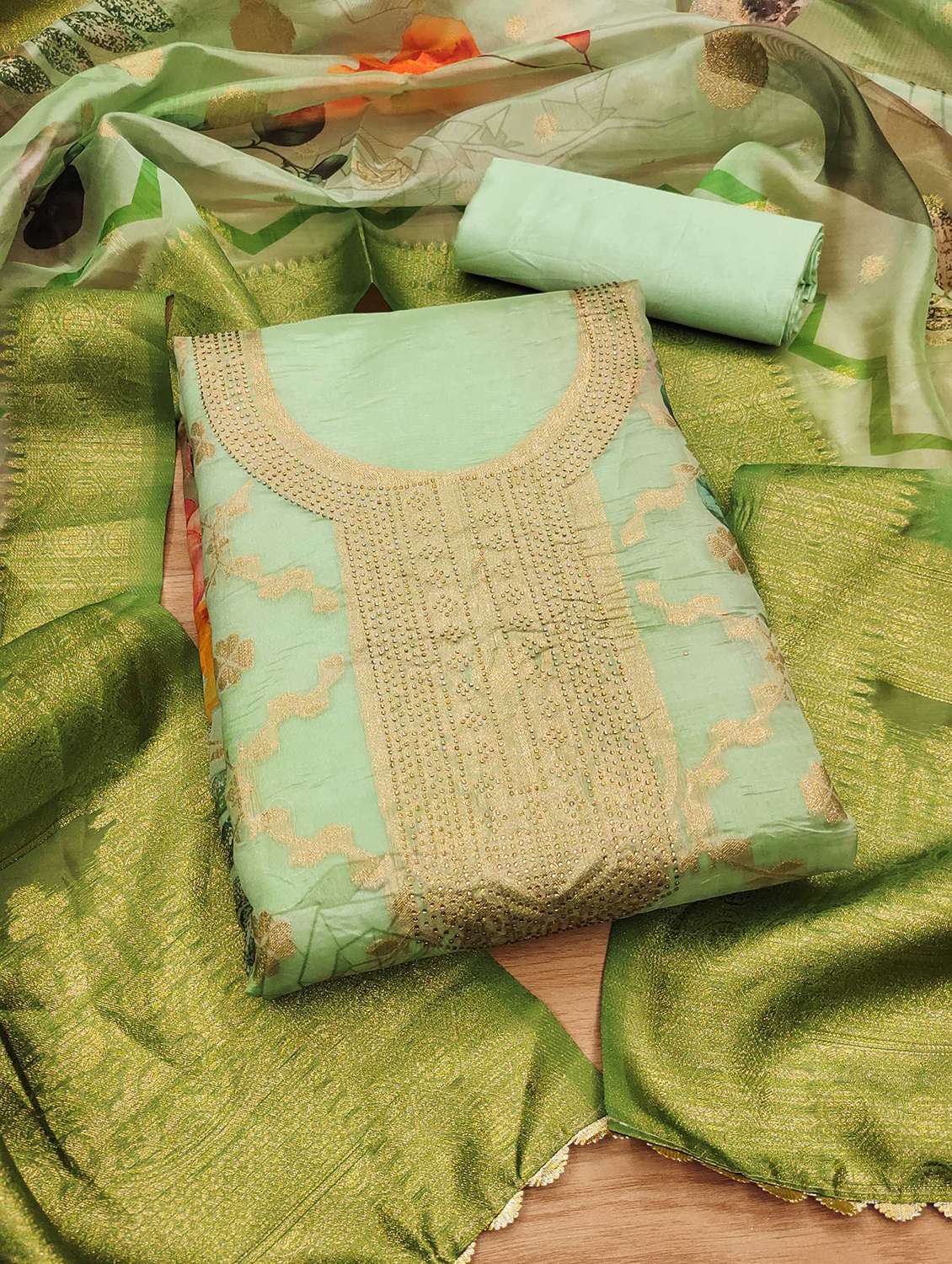 women self design embellished unstitched suit set