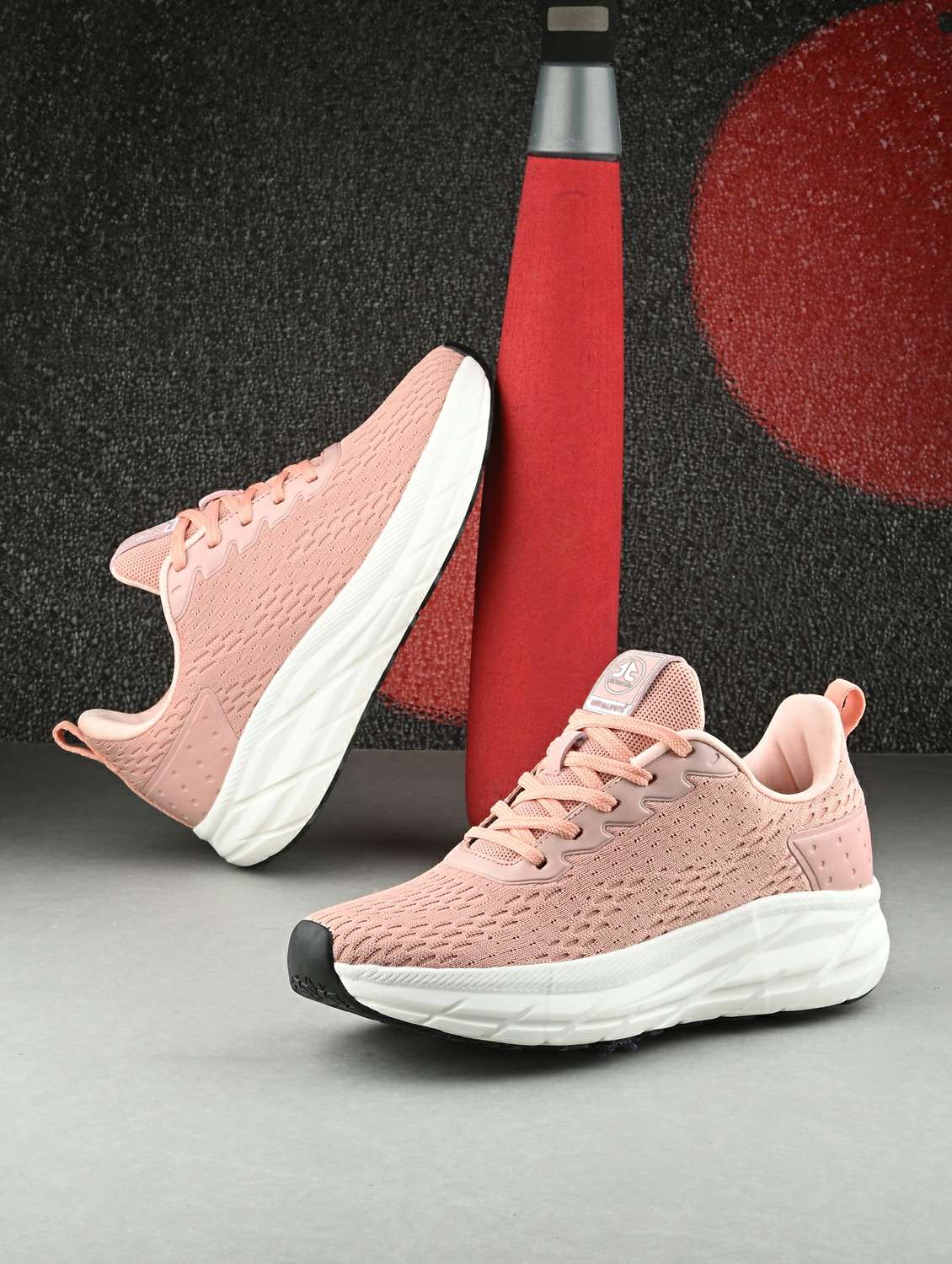 peach flyknit laceup sports shoes