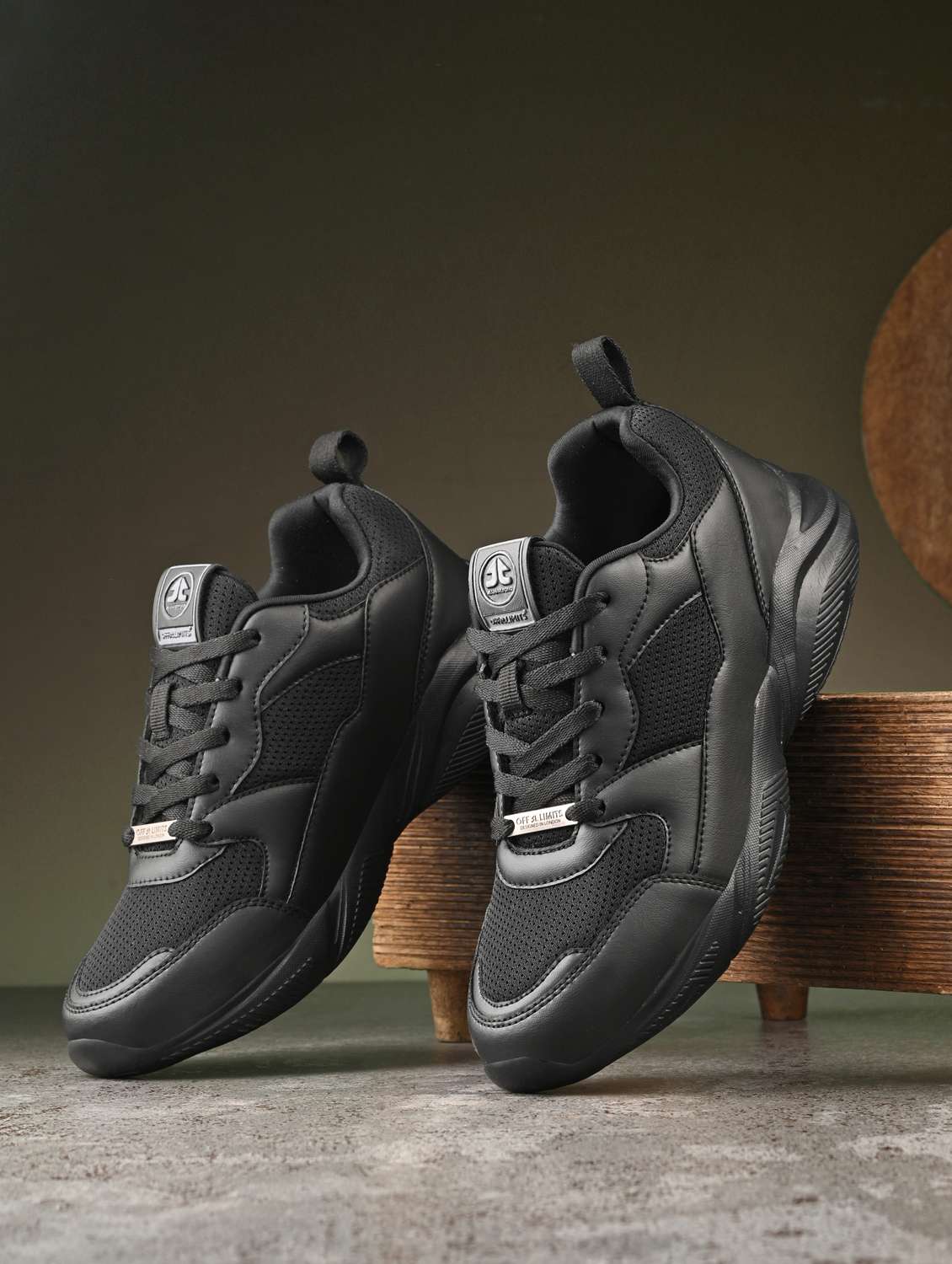 women black lace-up sports shoe