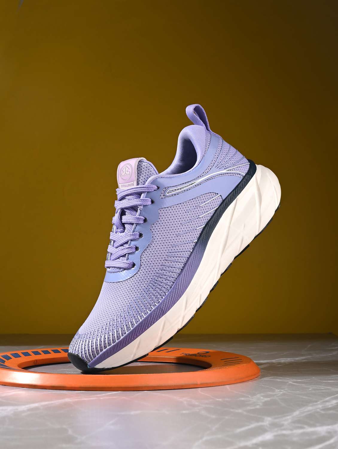 women purple lace-up sports shoe