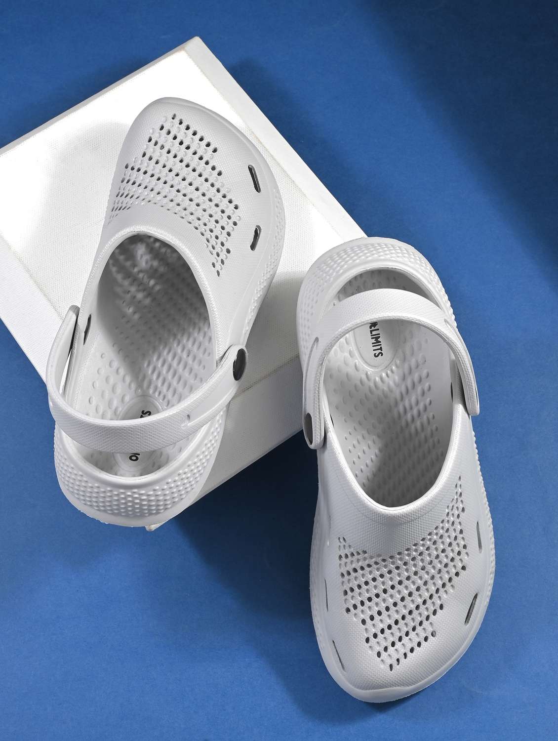 women grey solid clogs