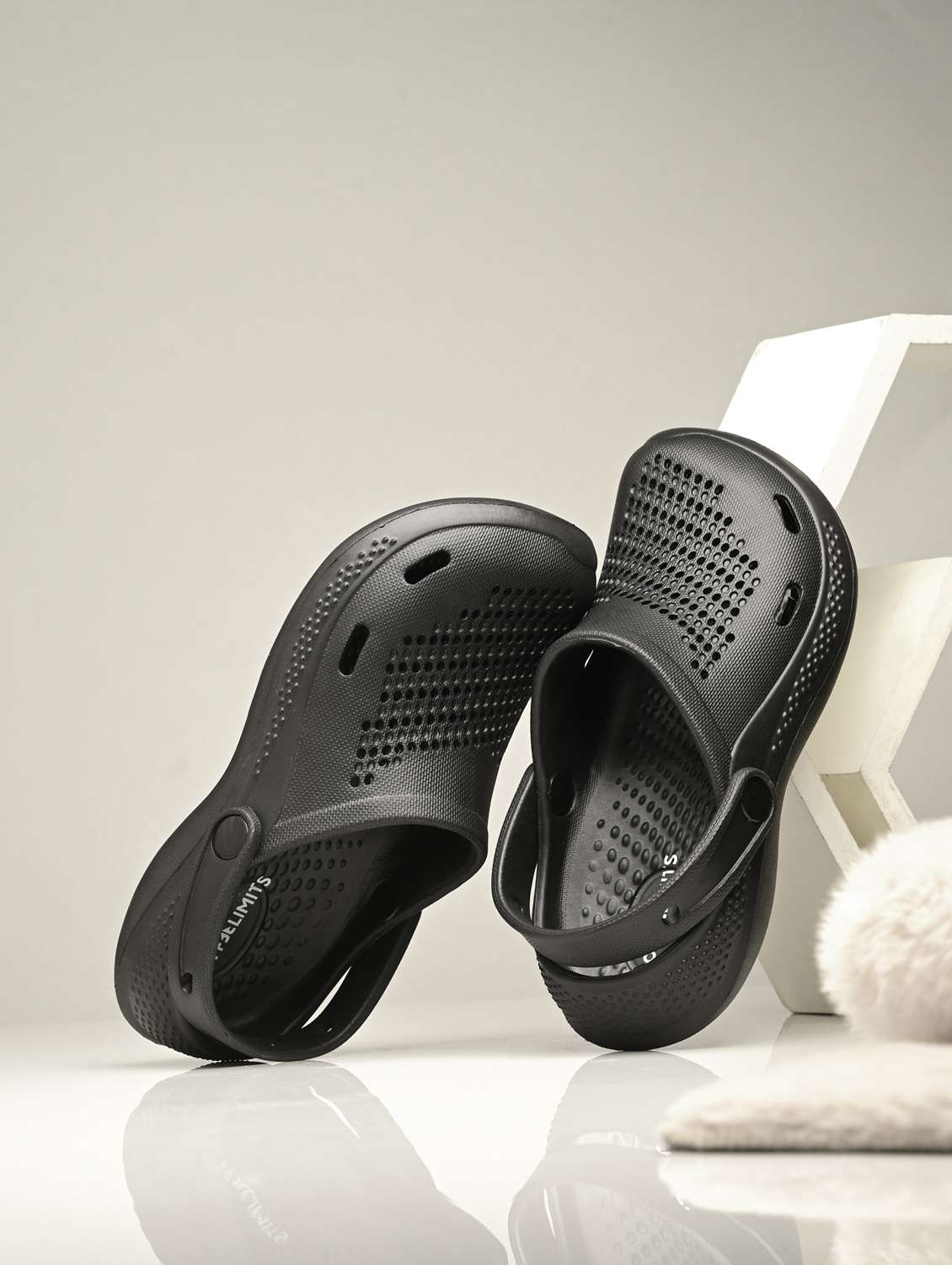women black solid clogs