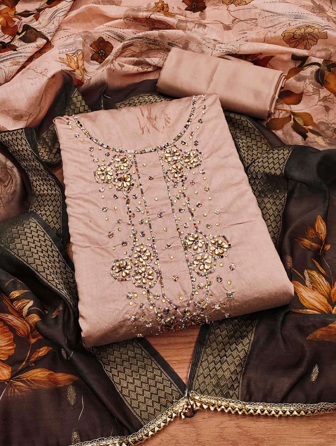 women solid with work embroidered unstitched suit set