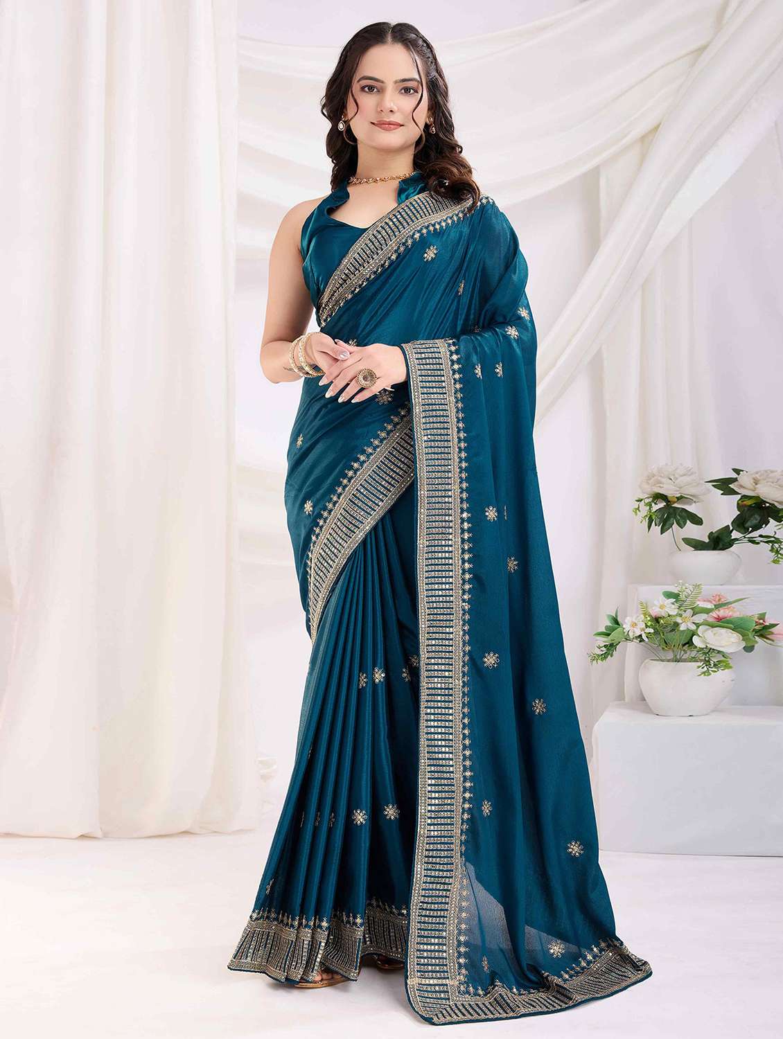 women solid with work embroidered saree with blouse