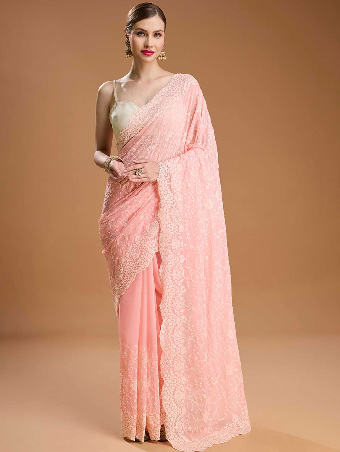 women solid with work embroidered saree with blouse