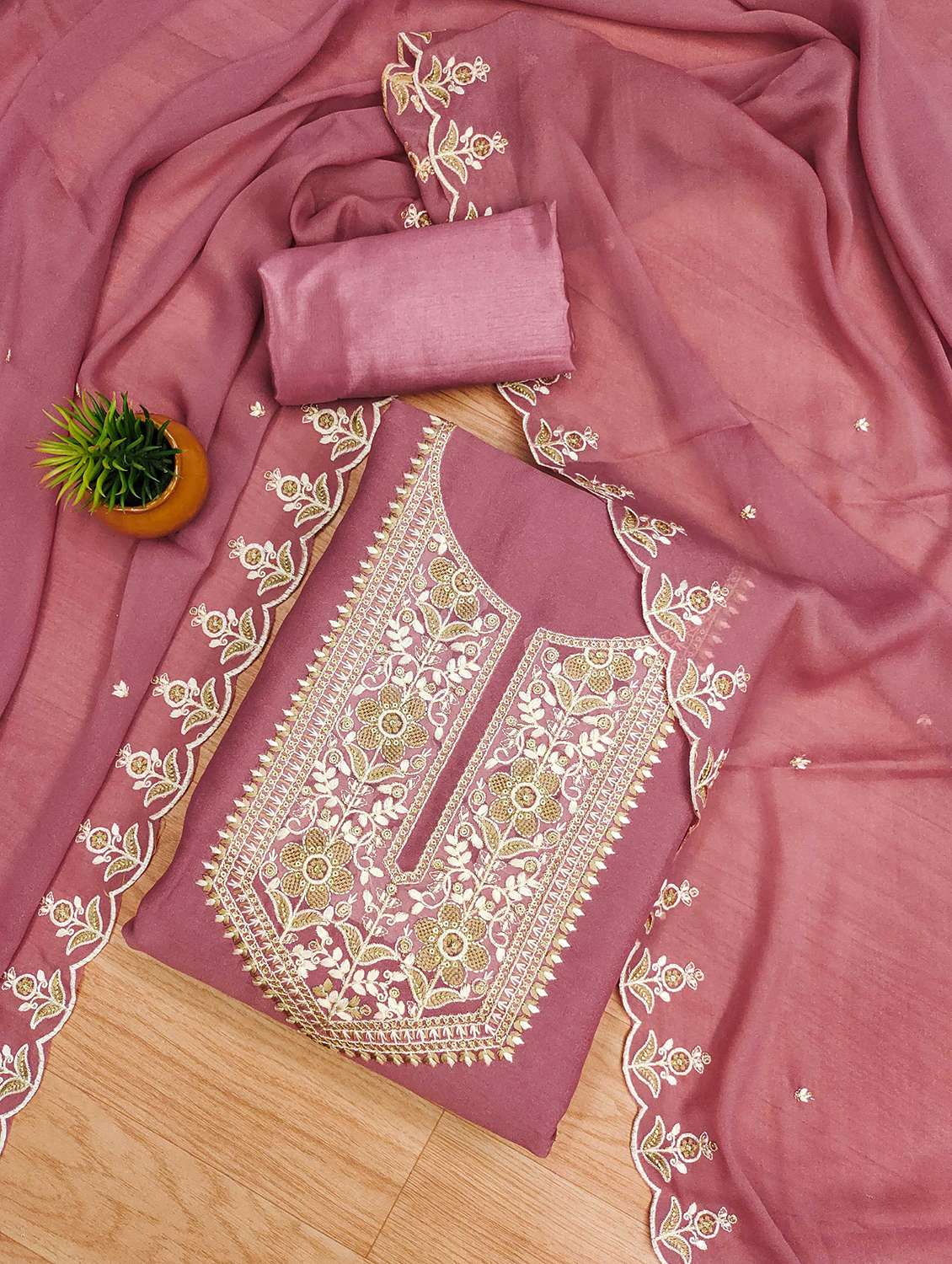 women solid with work embroidered unstitched suit set