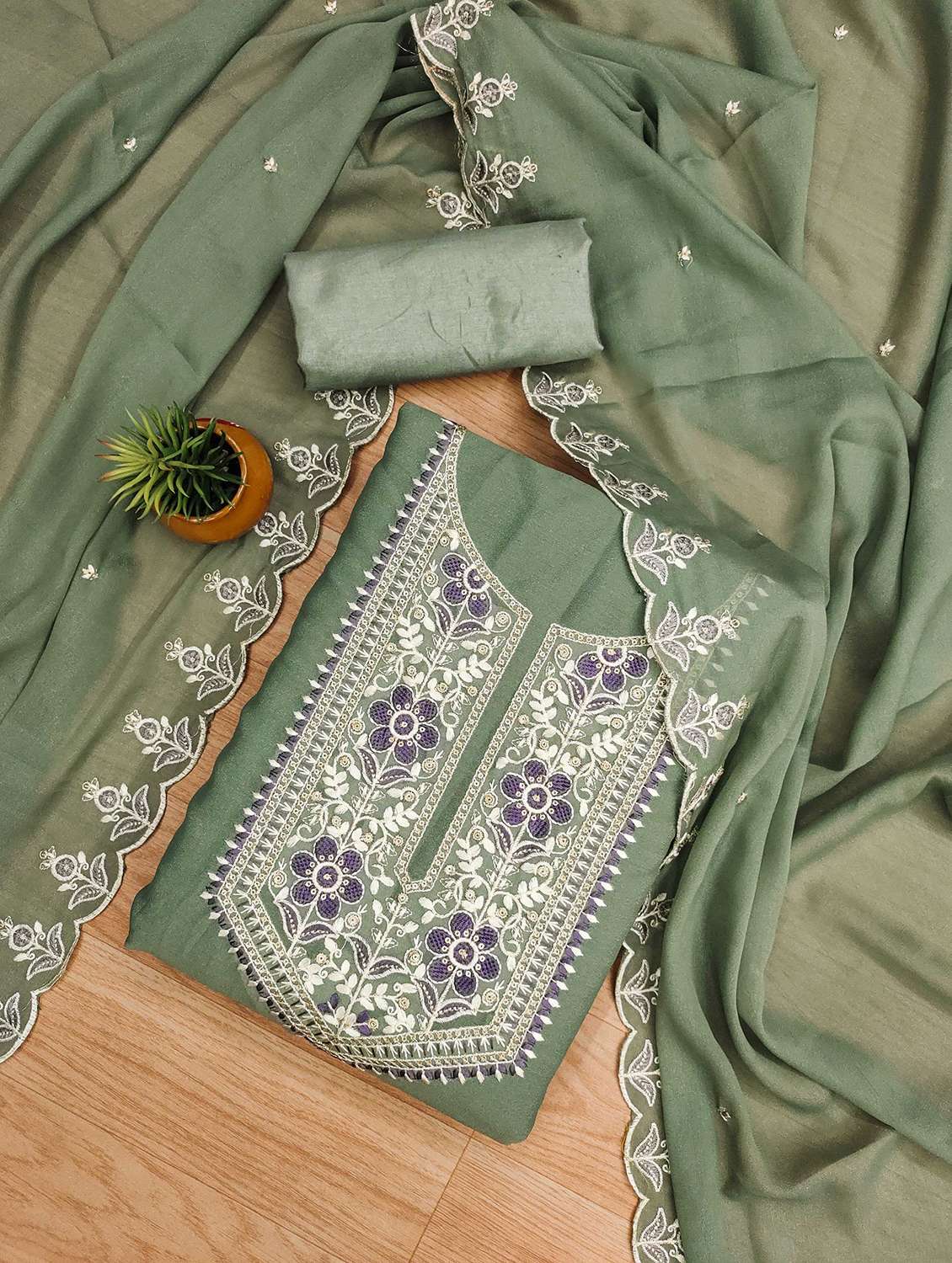 women solid with work embroidered unstitched suit set