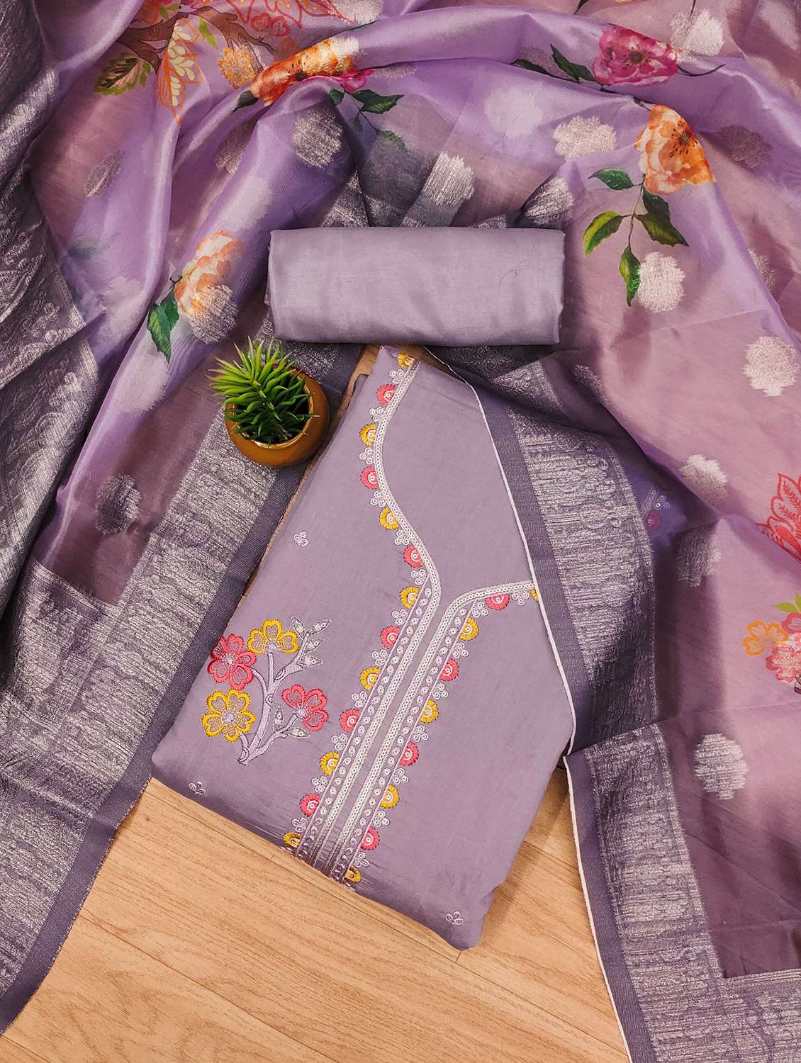 women solid with work embroidered unstitched suit set