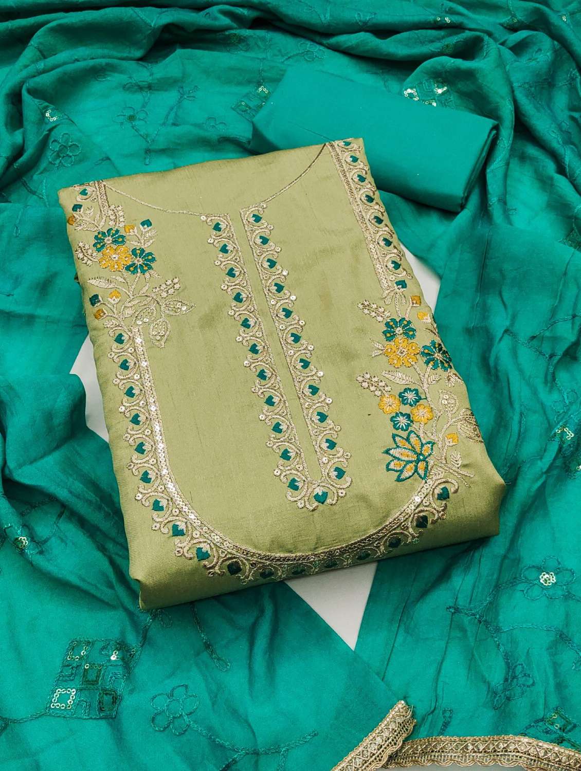 women solid with work embroidered unstitched suit set