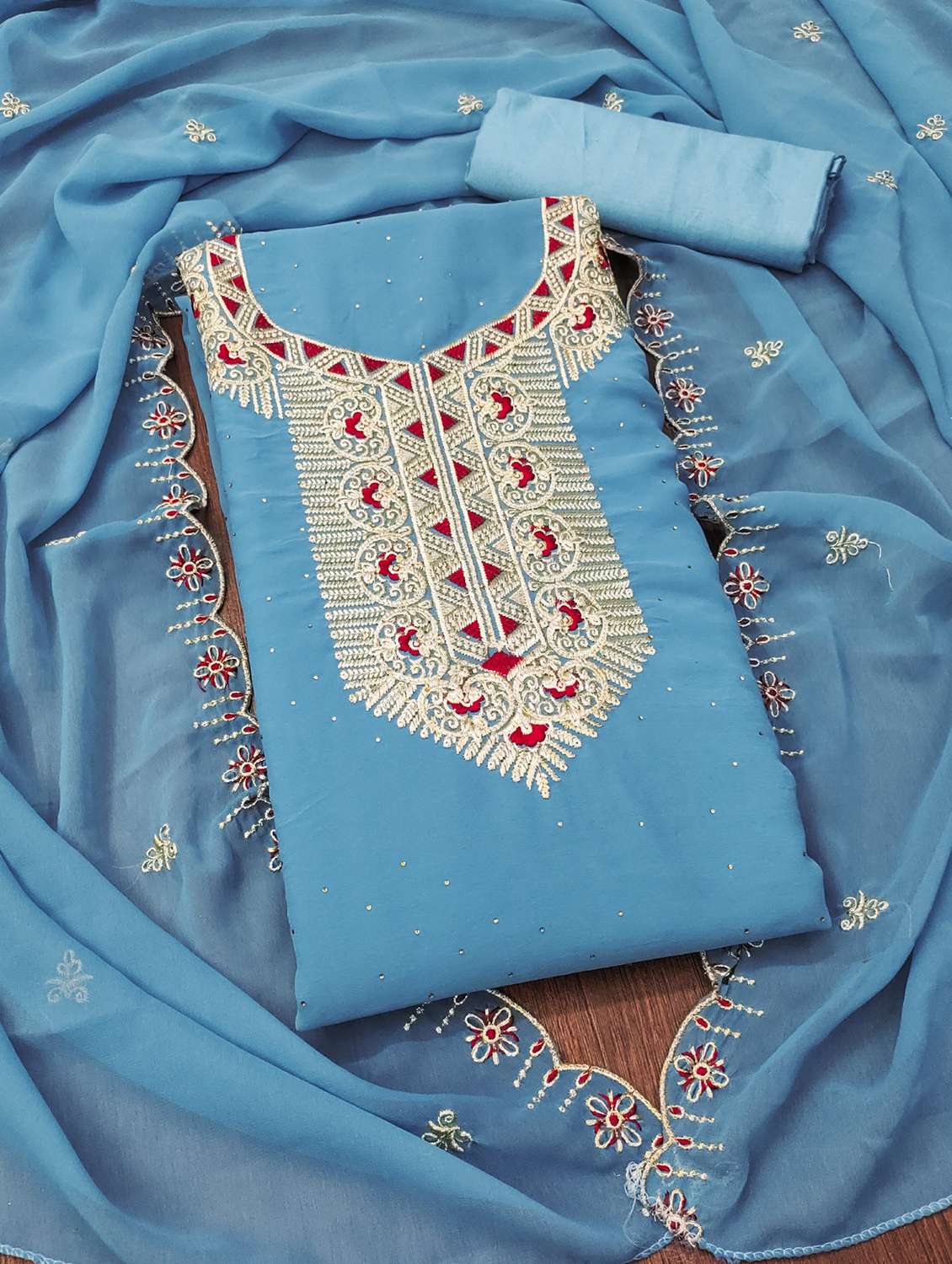 women solid with work embroidered unstitched suit set