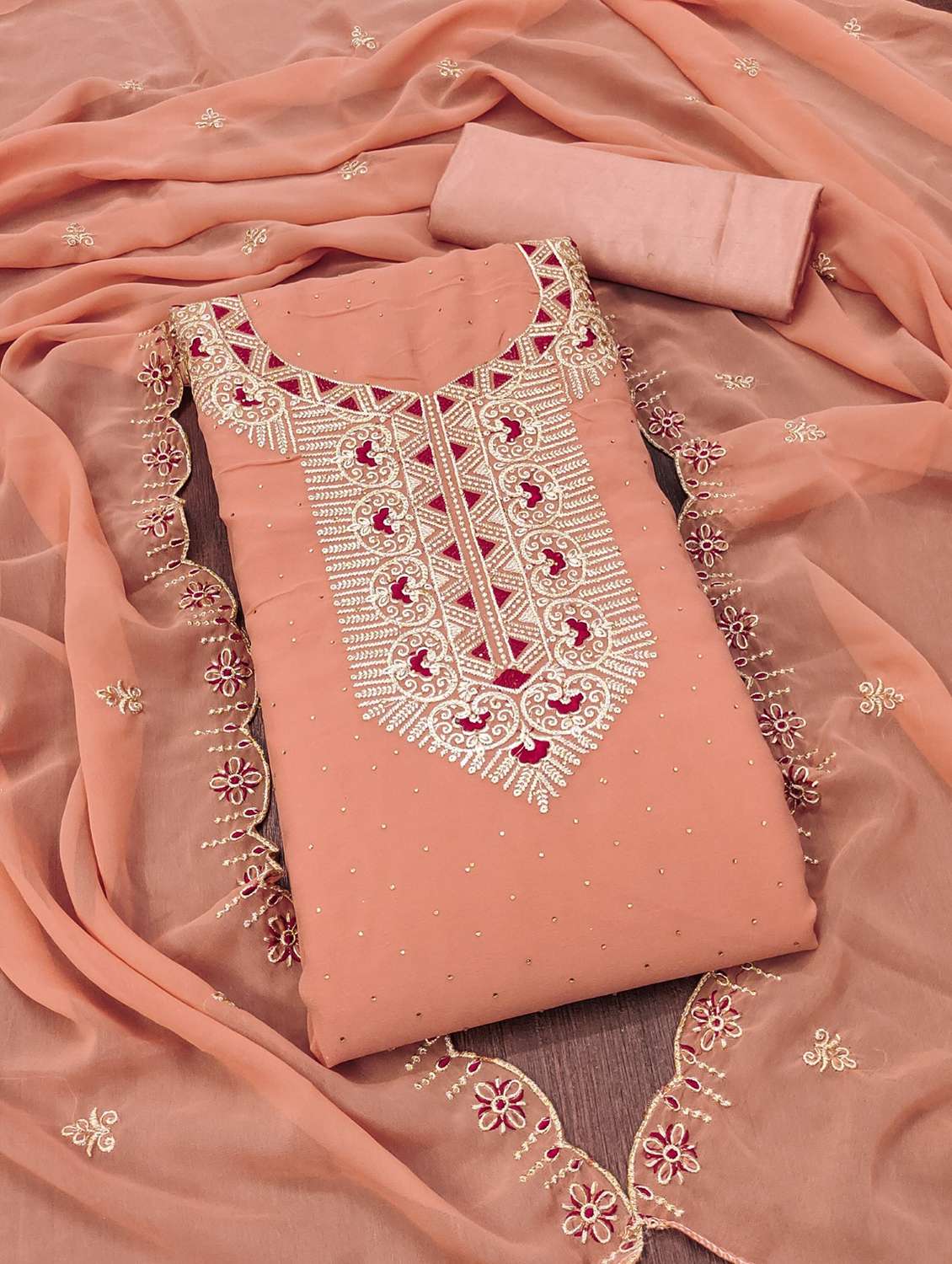 women solid with work embroidered unstitched suit set