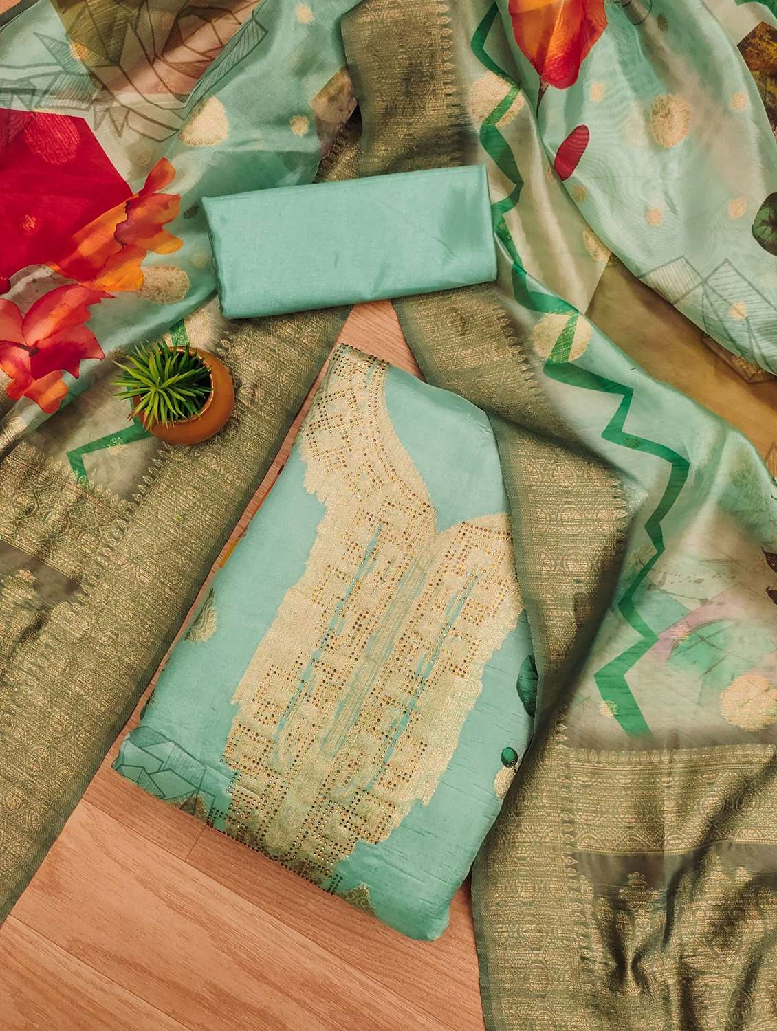 women self design embellished unstitched suit set